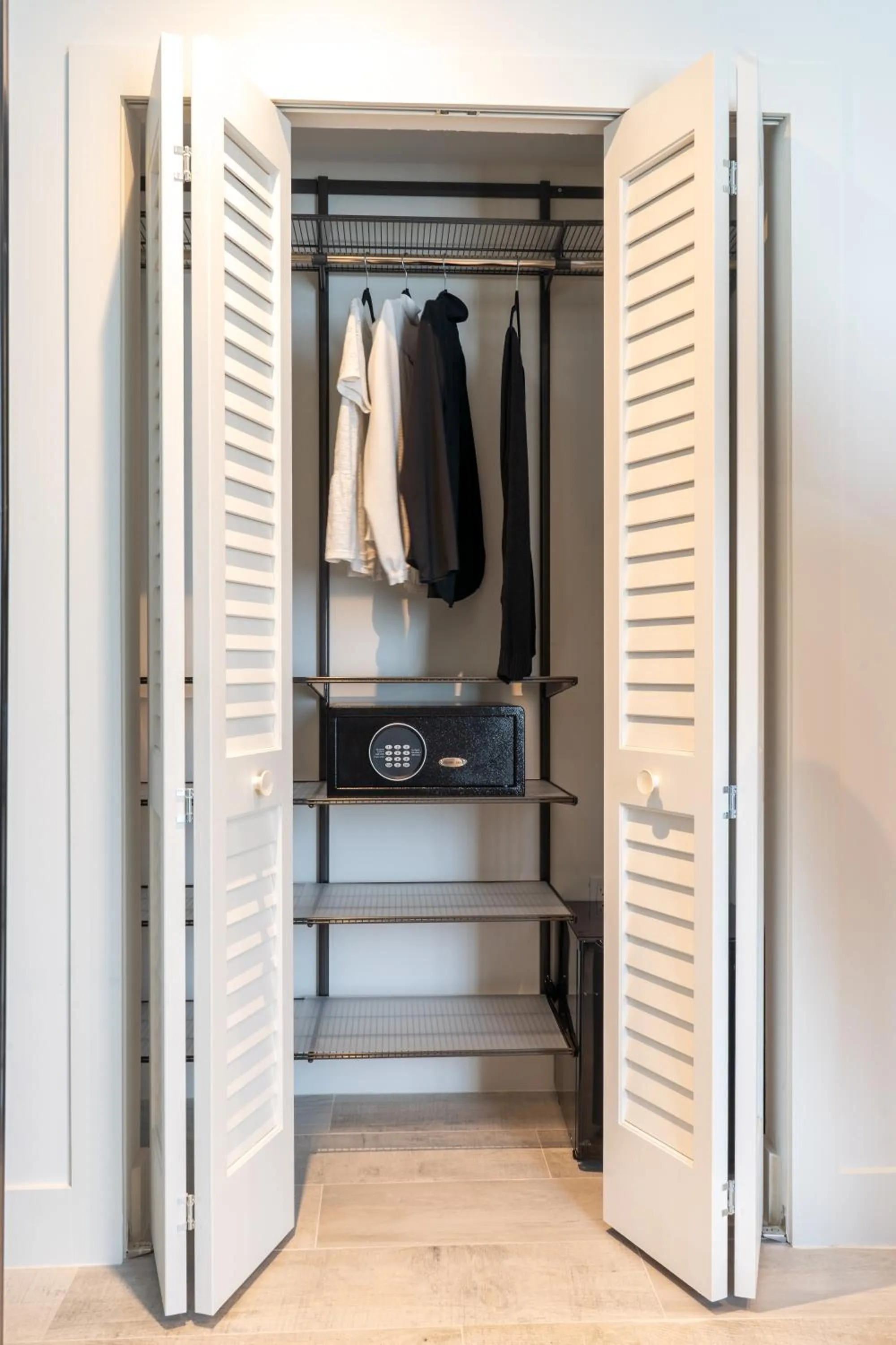 wardrobe in Nassau Suite South Beach, an All Suite Hotel