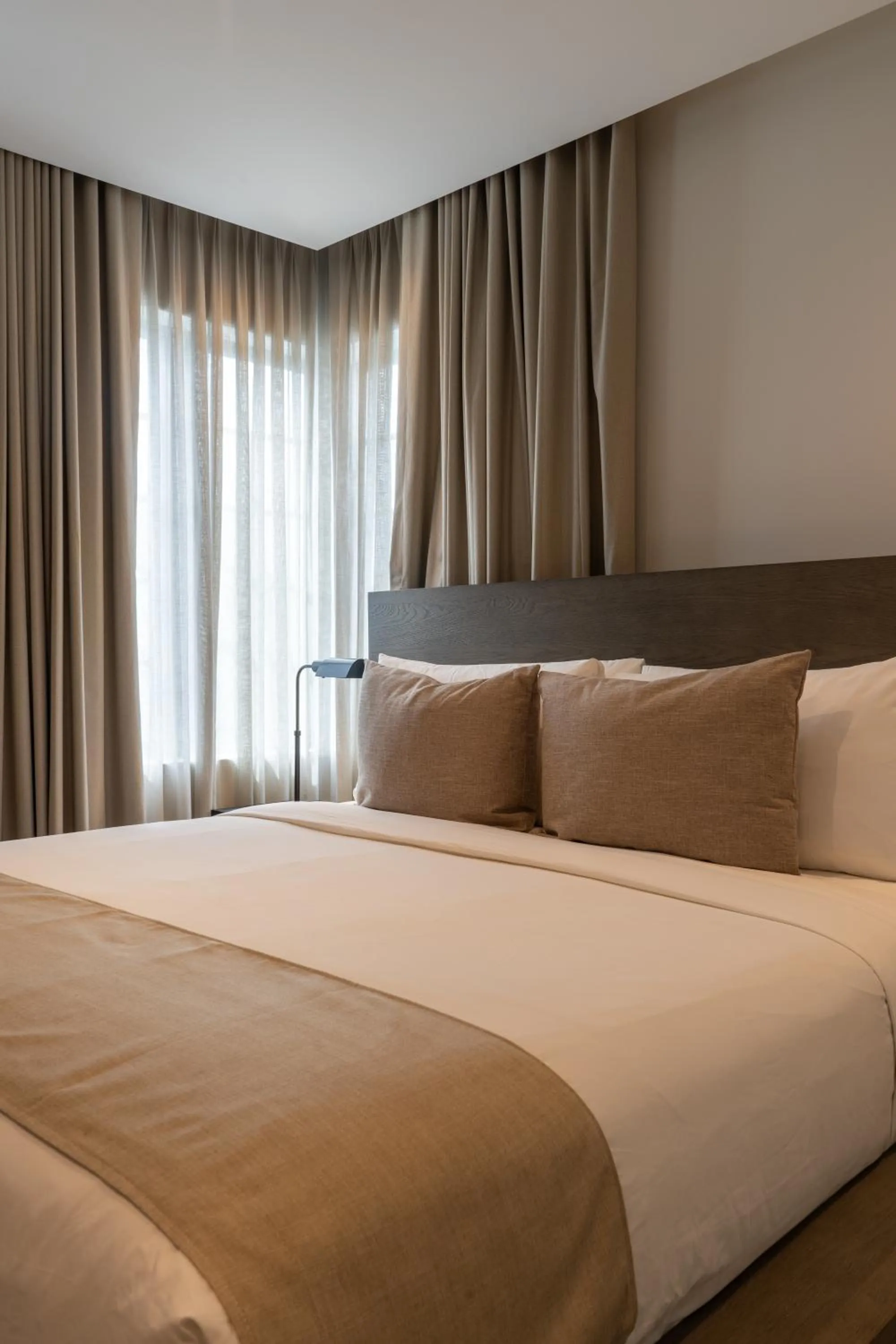 Bed in Nassau Suite South Beach, an All Suite Hotel