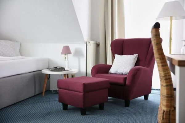 Seating area, Bed in Hotel Lammerts