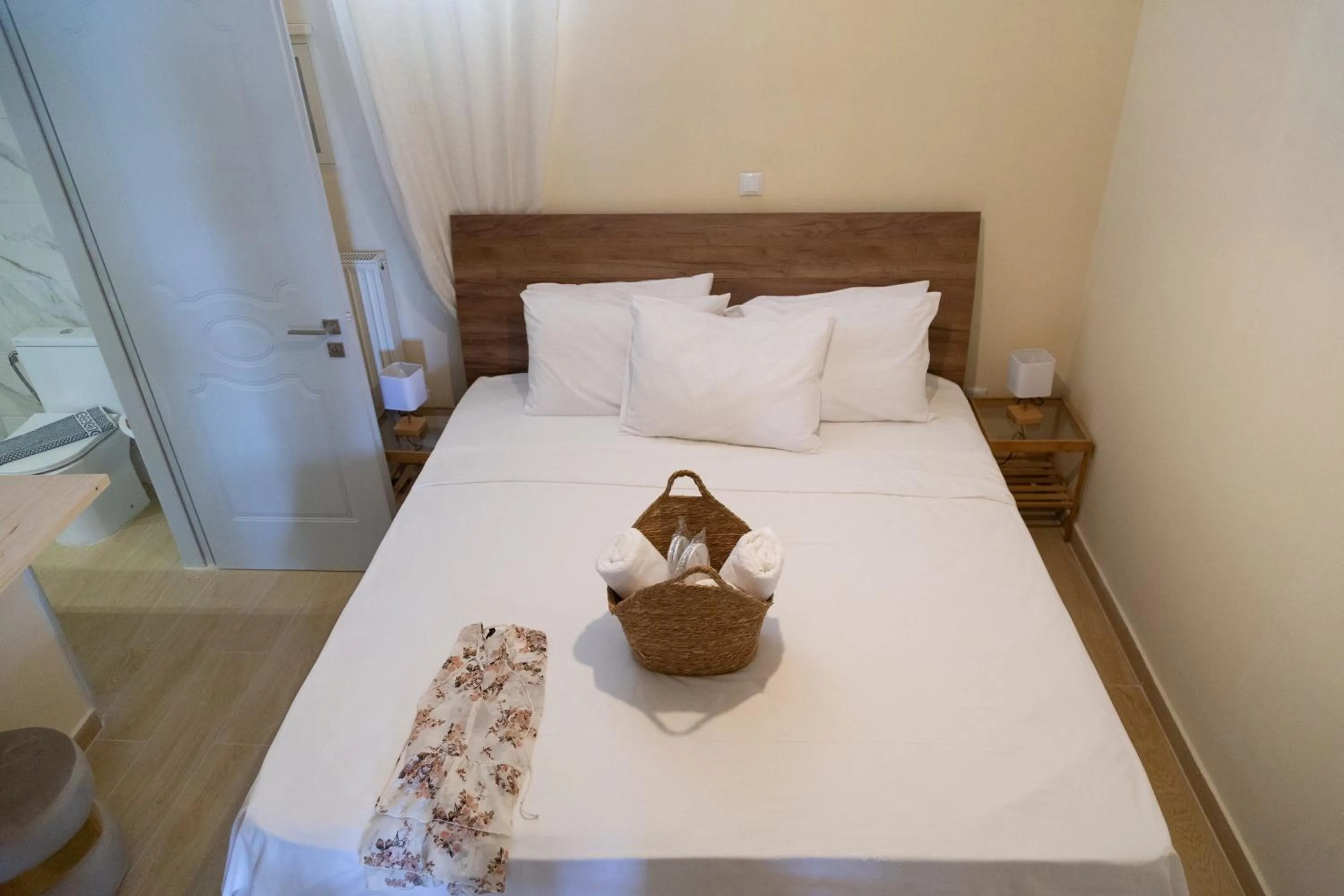 Bed in Poseidon Apartments and Villas by the Sea