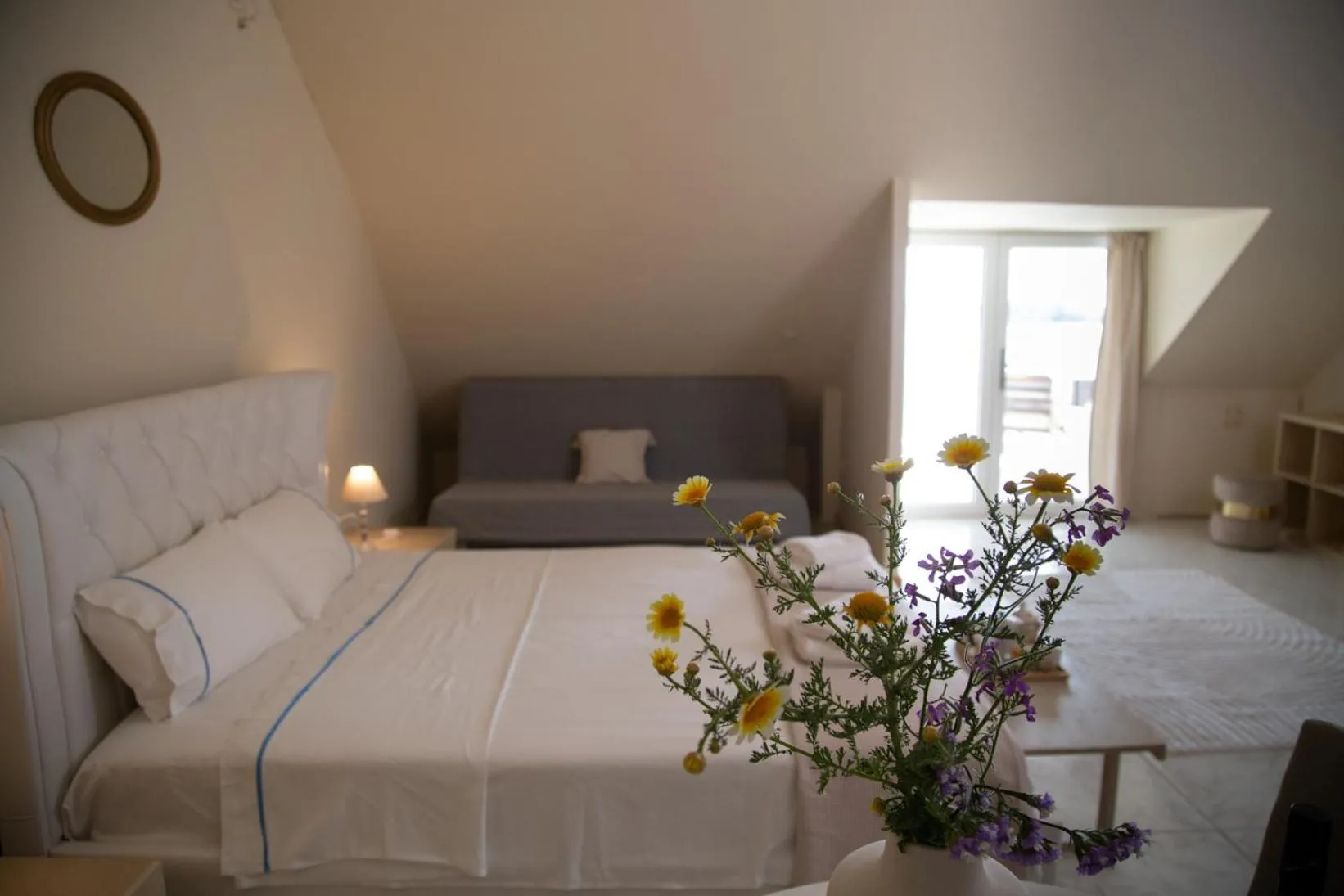 Bed in Poseidon Apartments and Villas by the Sea