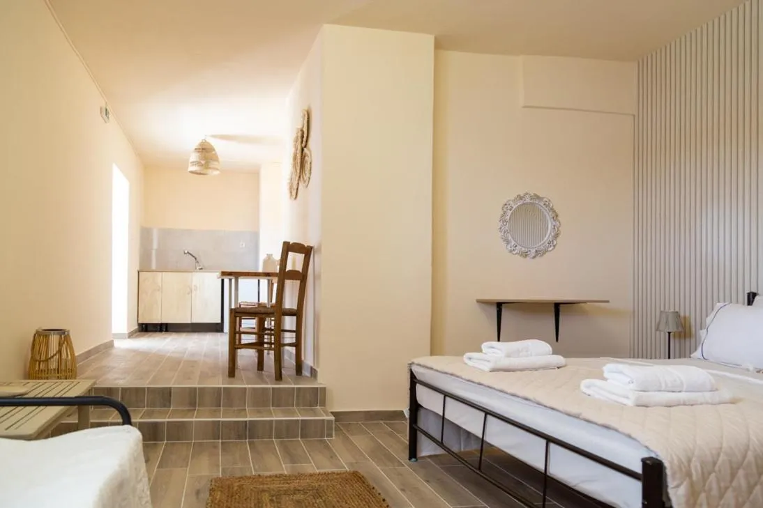 Bed in Poseidon Apartments and Villas by the Sea