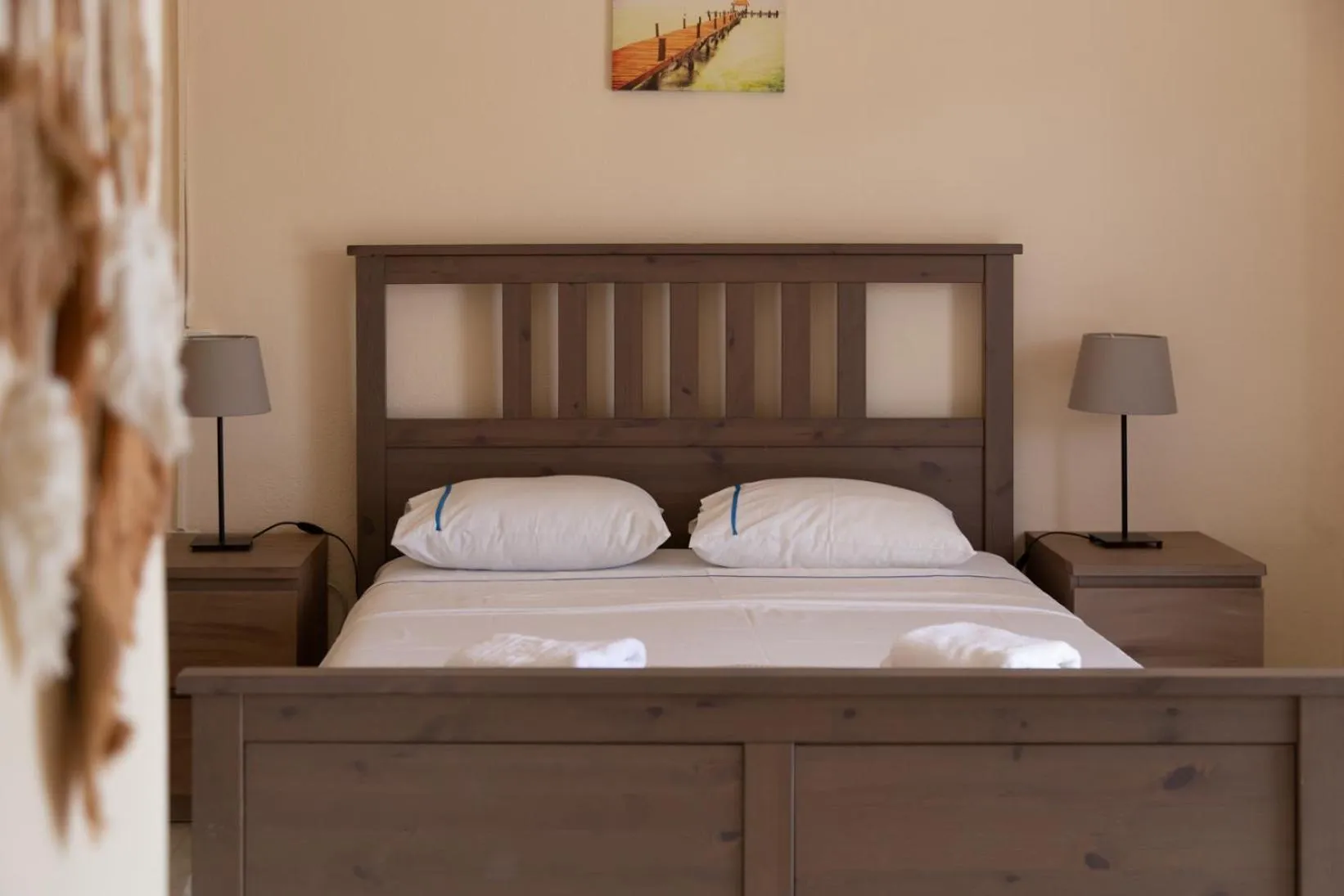 Bed in Poseidon Apartments and Villas by the Sea