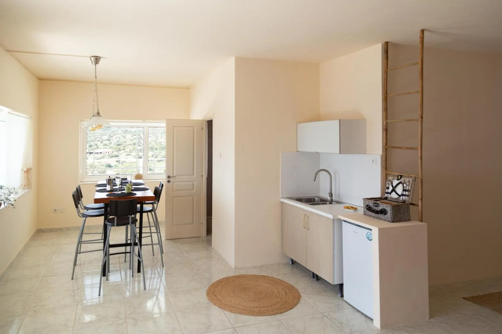 Kitchen or kitchenette in Poseidon Apartments and Villas by the Sea
