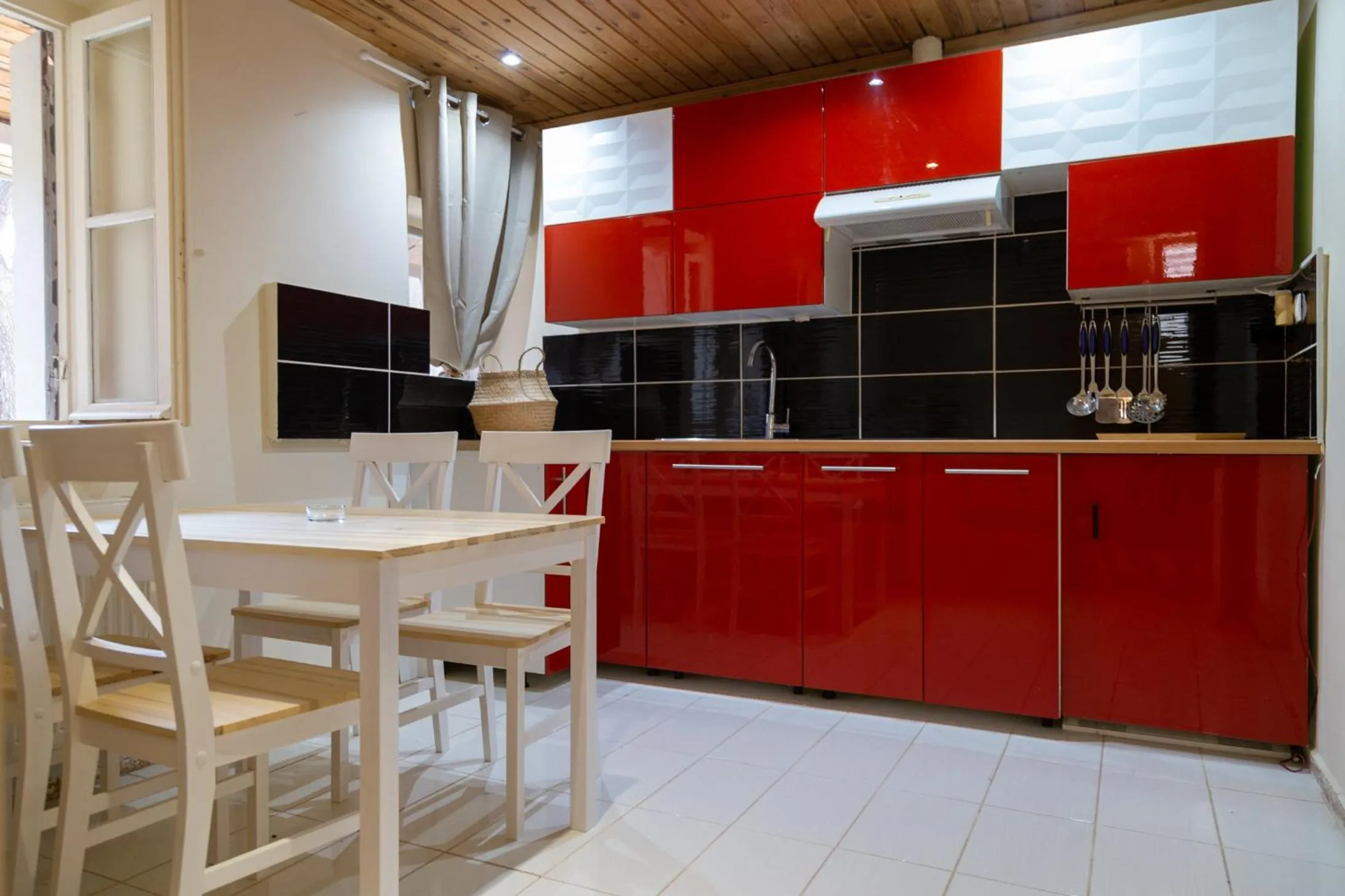 Kitchen or kitchenette in Poseidon Apartments and Villas by the Sea