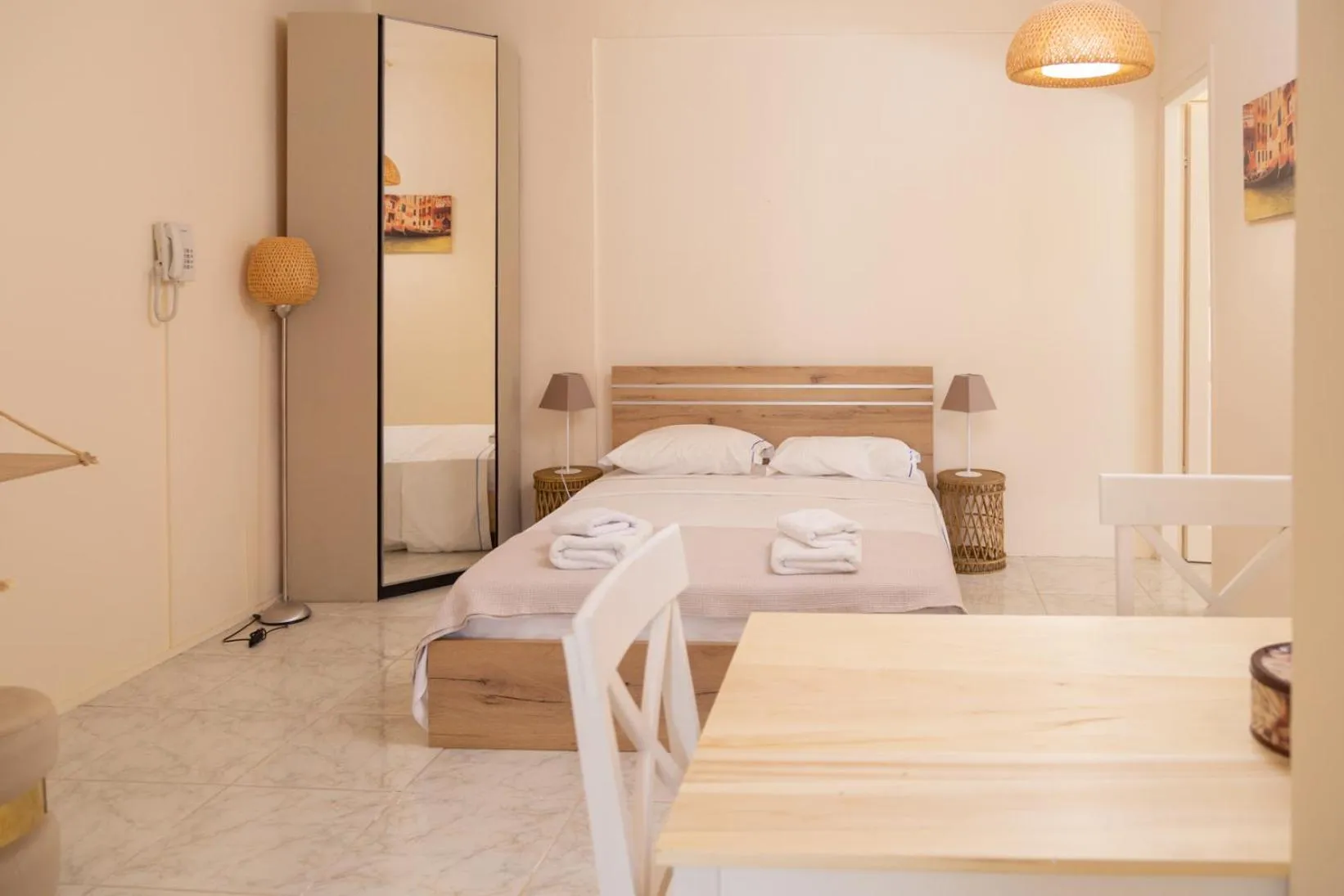 Bed in Poseidon Apartments and Villas by the Sea