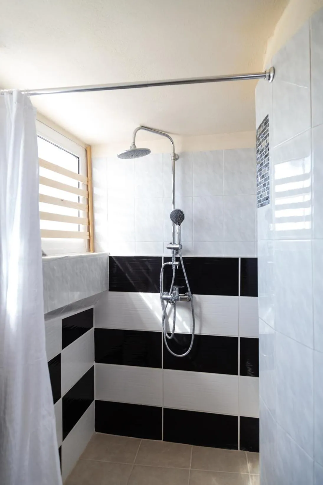 Shower in Poseidon Apartments and Villas by the Sea