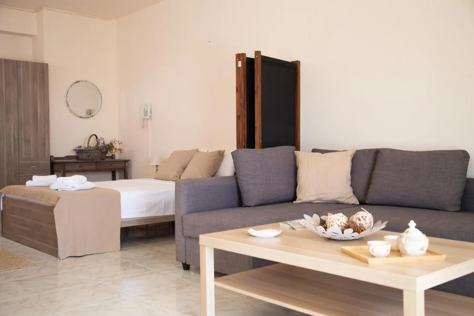 Bed in Poseidon Apartments and Villas by the Sea