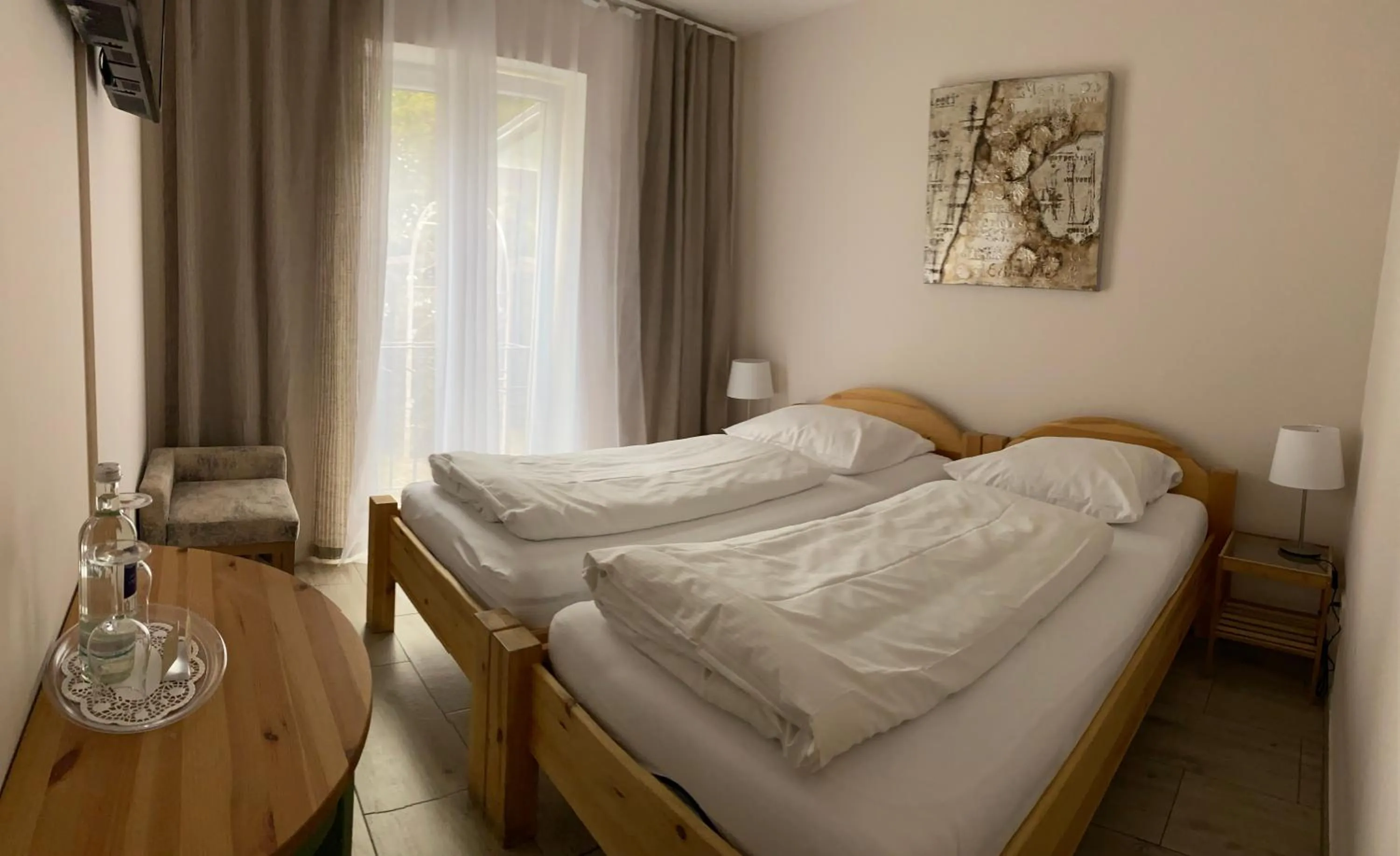 Photo of the whole room, Bed in Arena Stadt München