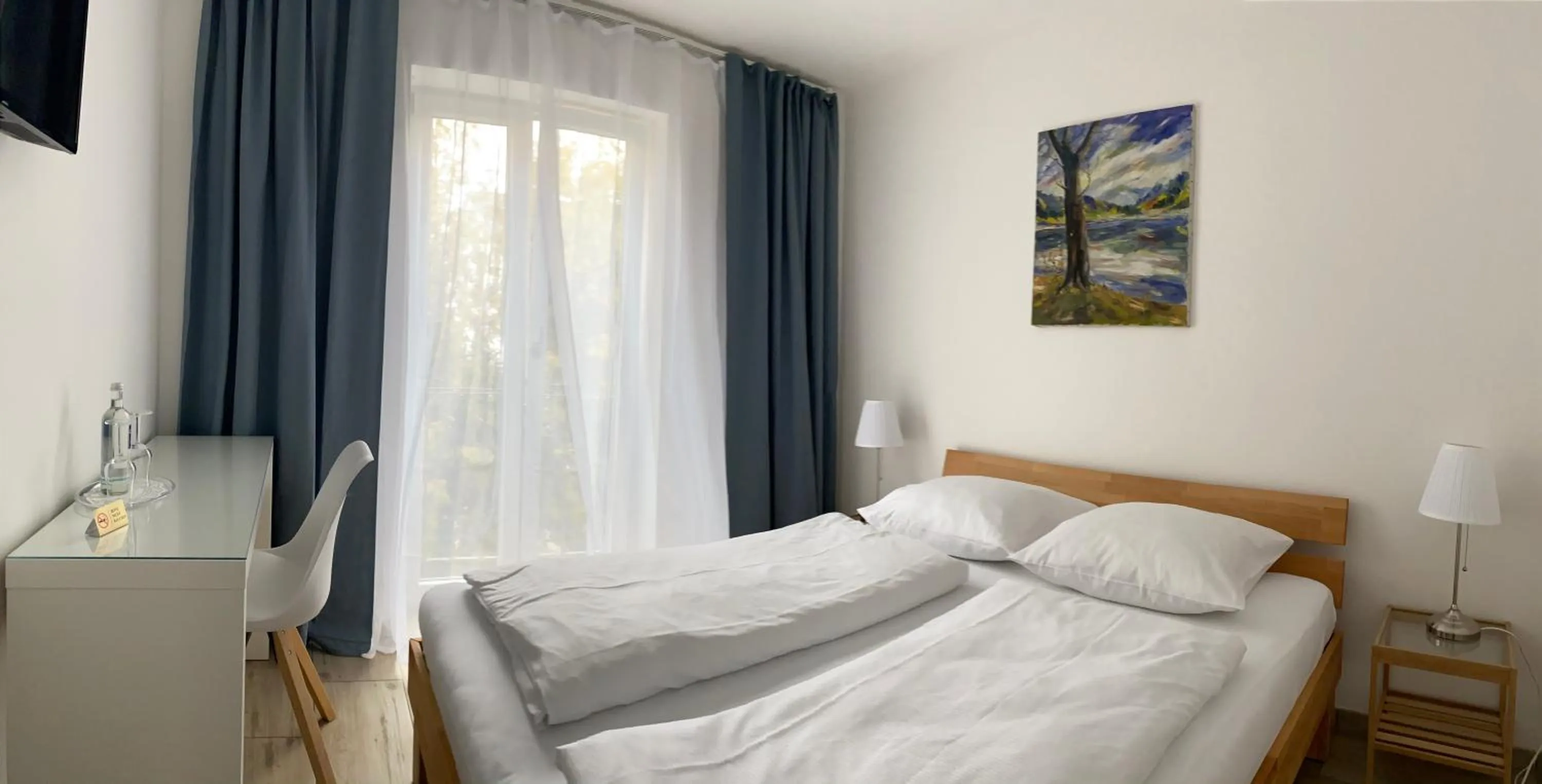 Photo of the whole room, Bed in Arena Stadt München