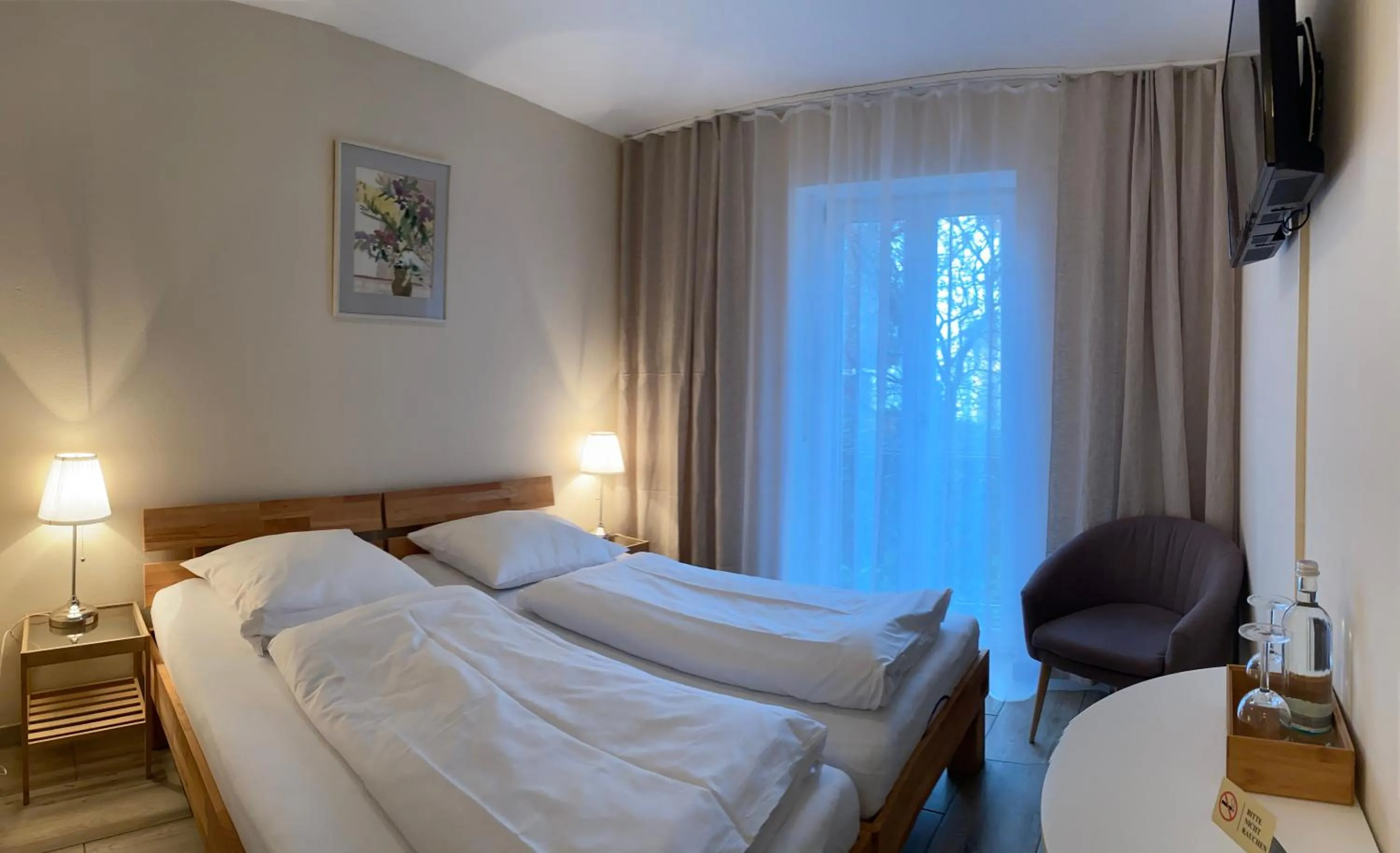 Photo of the whole room, Bed in Arena Stadt München