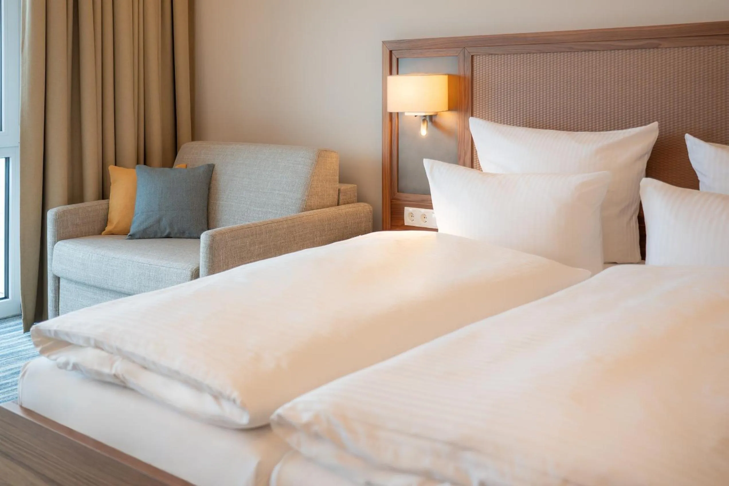 Photo of the whole room, Bed in Strandhotel Seerose