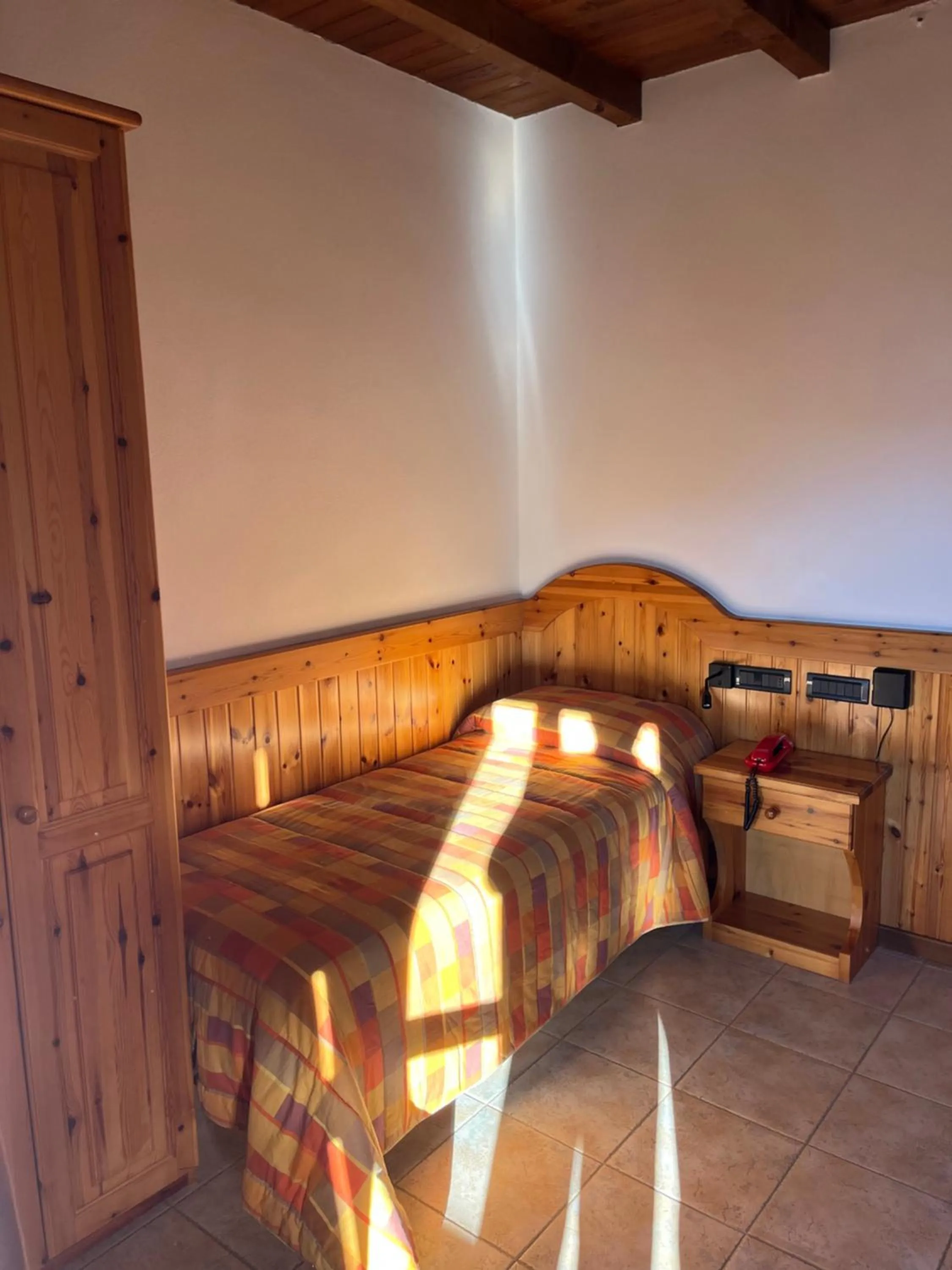 Bedroom in Albergo Piazzatorre