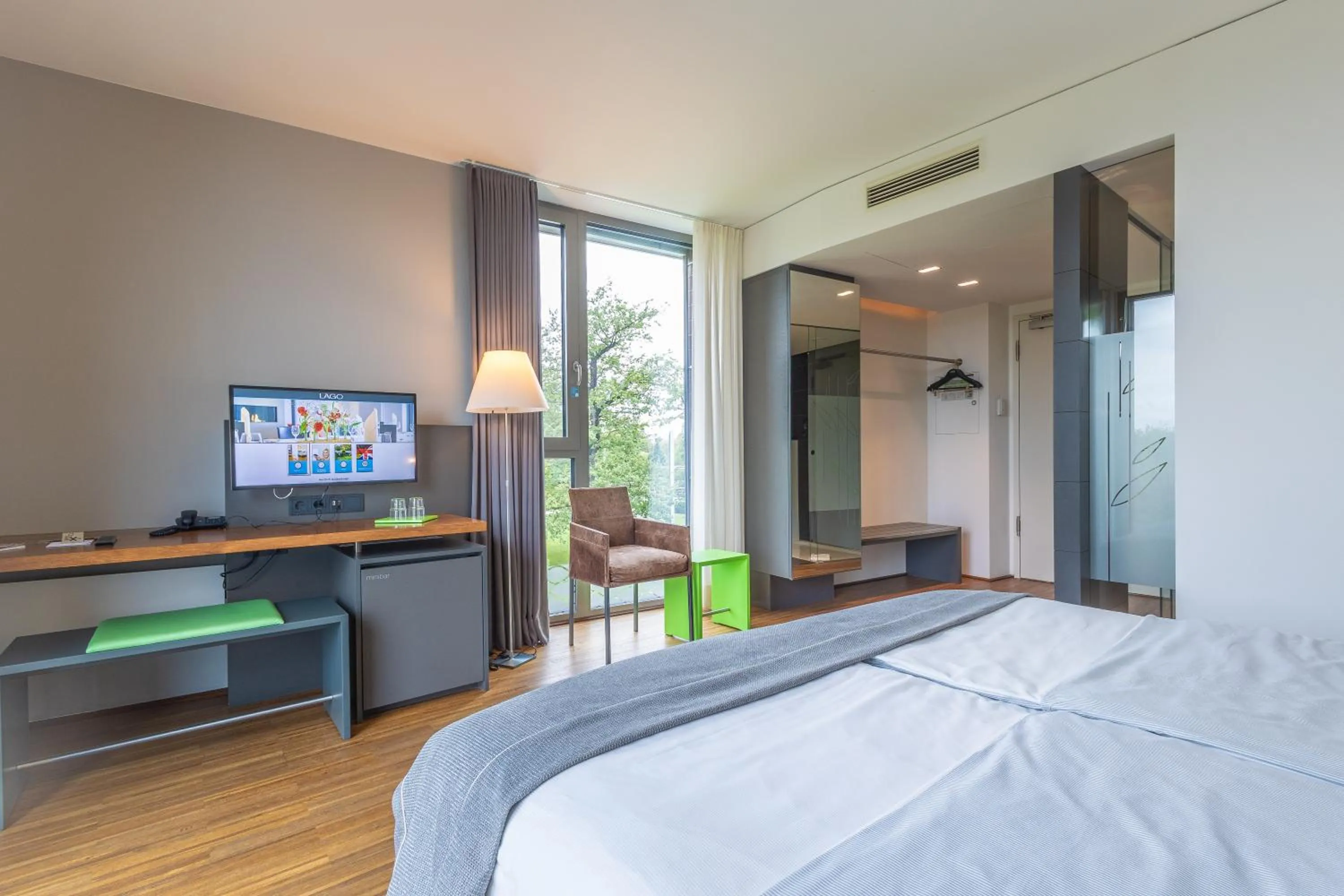 TV and multimedia, Bed in LAGO hotel & restaurant am see