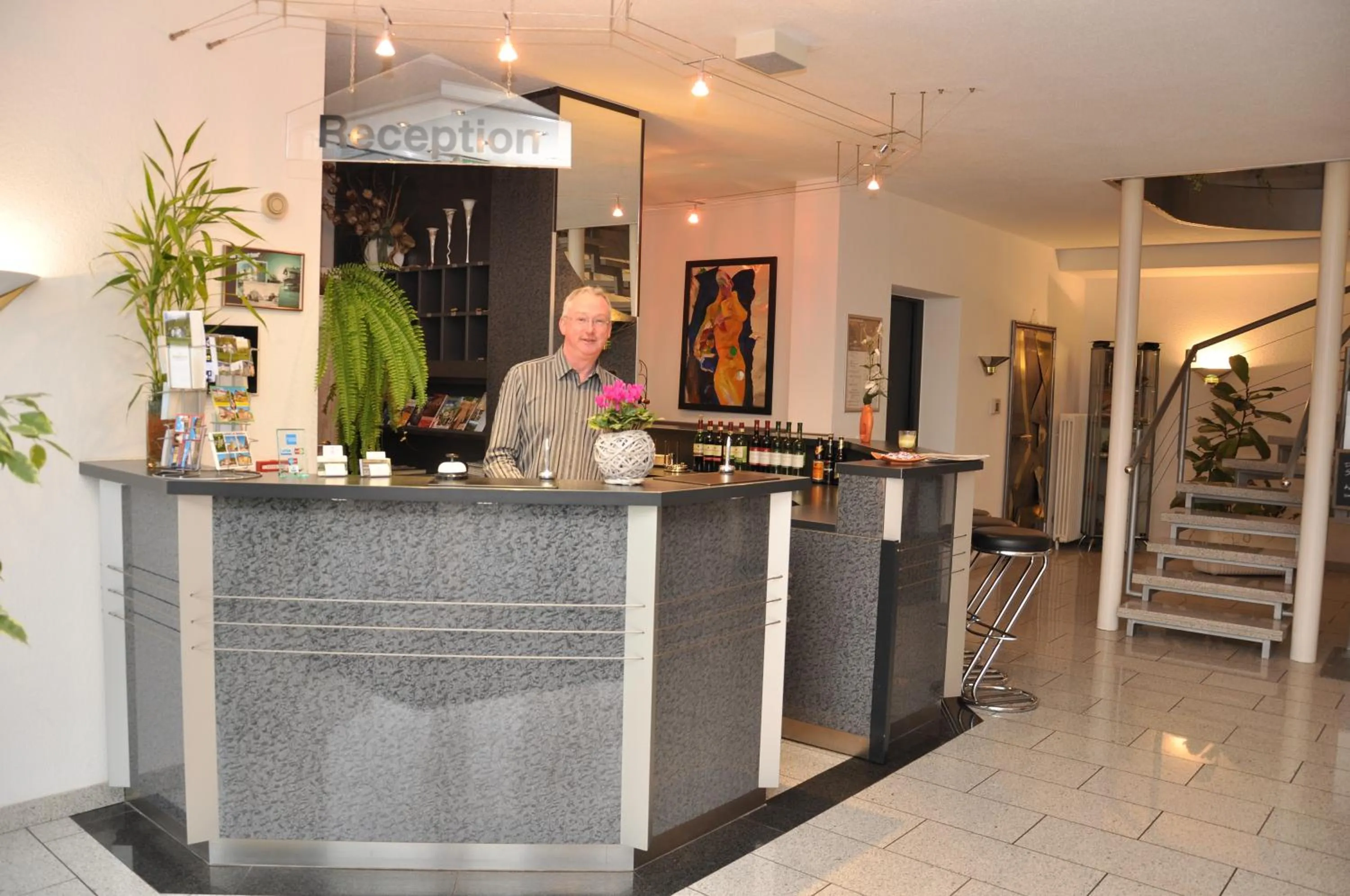 Lobby or reception in AltstadtHotel an der Werra