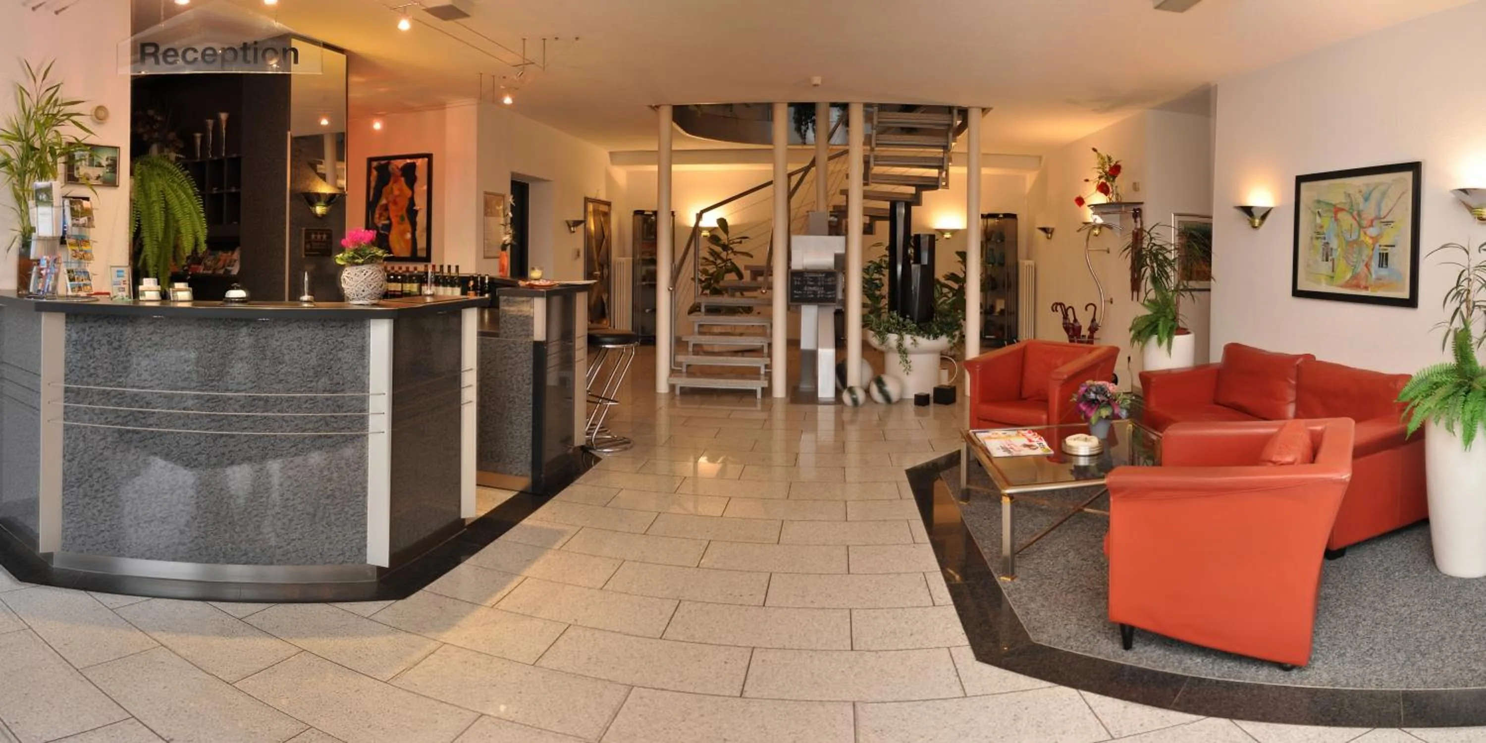 Lobby or reception in AltstadtHotel an der Werra