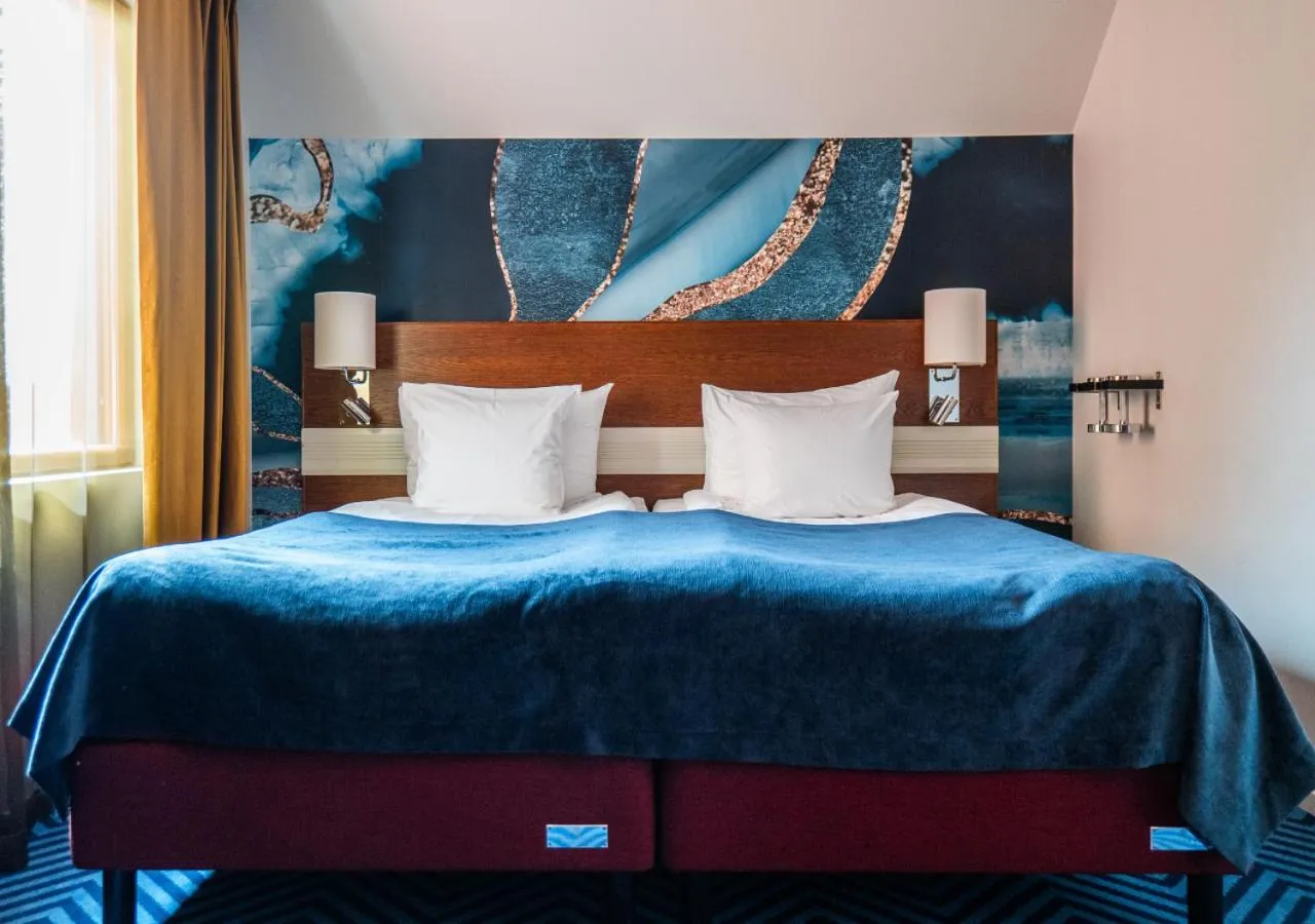 Bed in ProfilHotels Opera