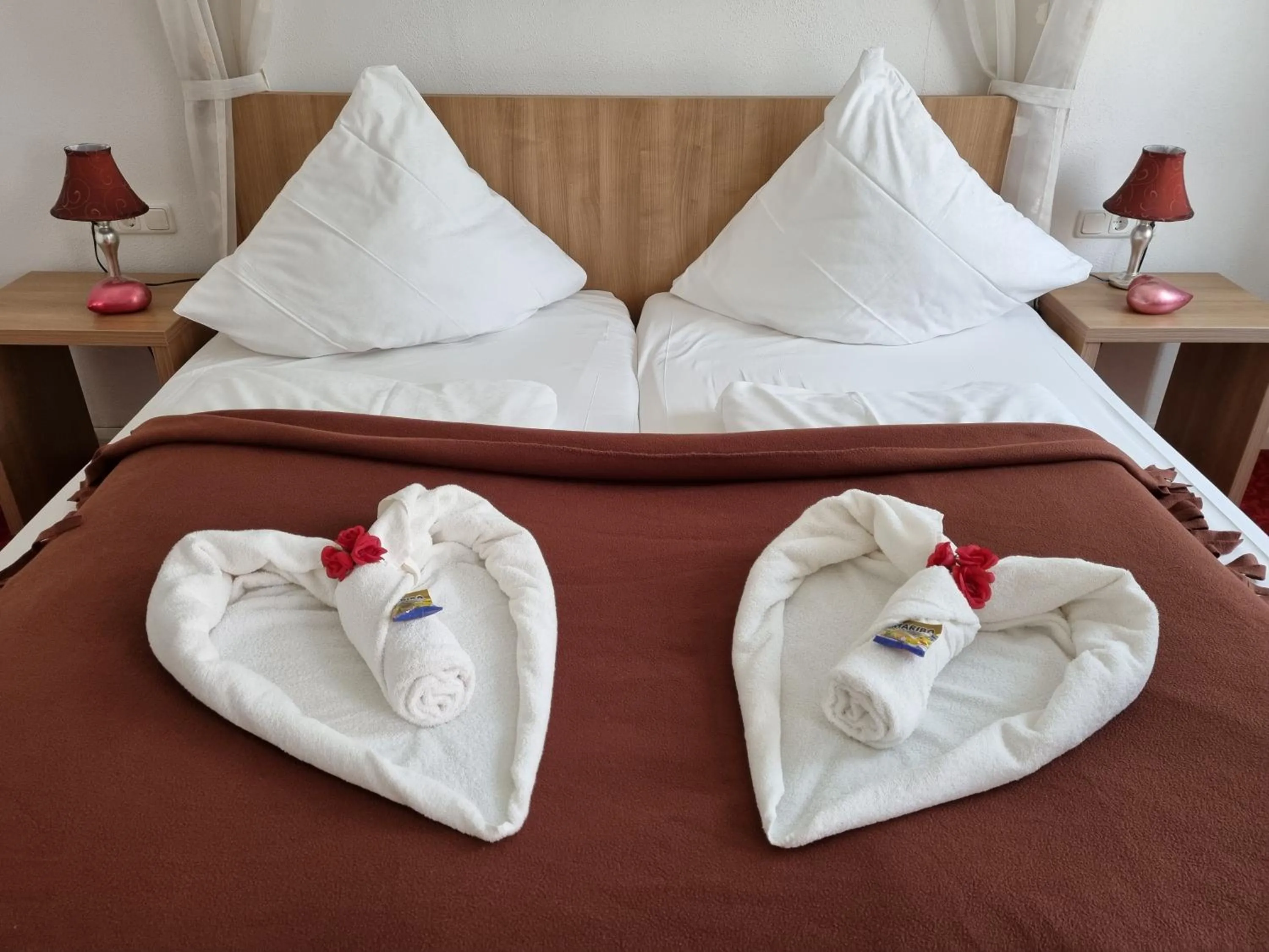 Bed in Boutiquehotel Goldene Rose - self-check-in