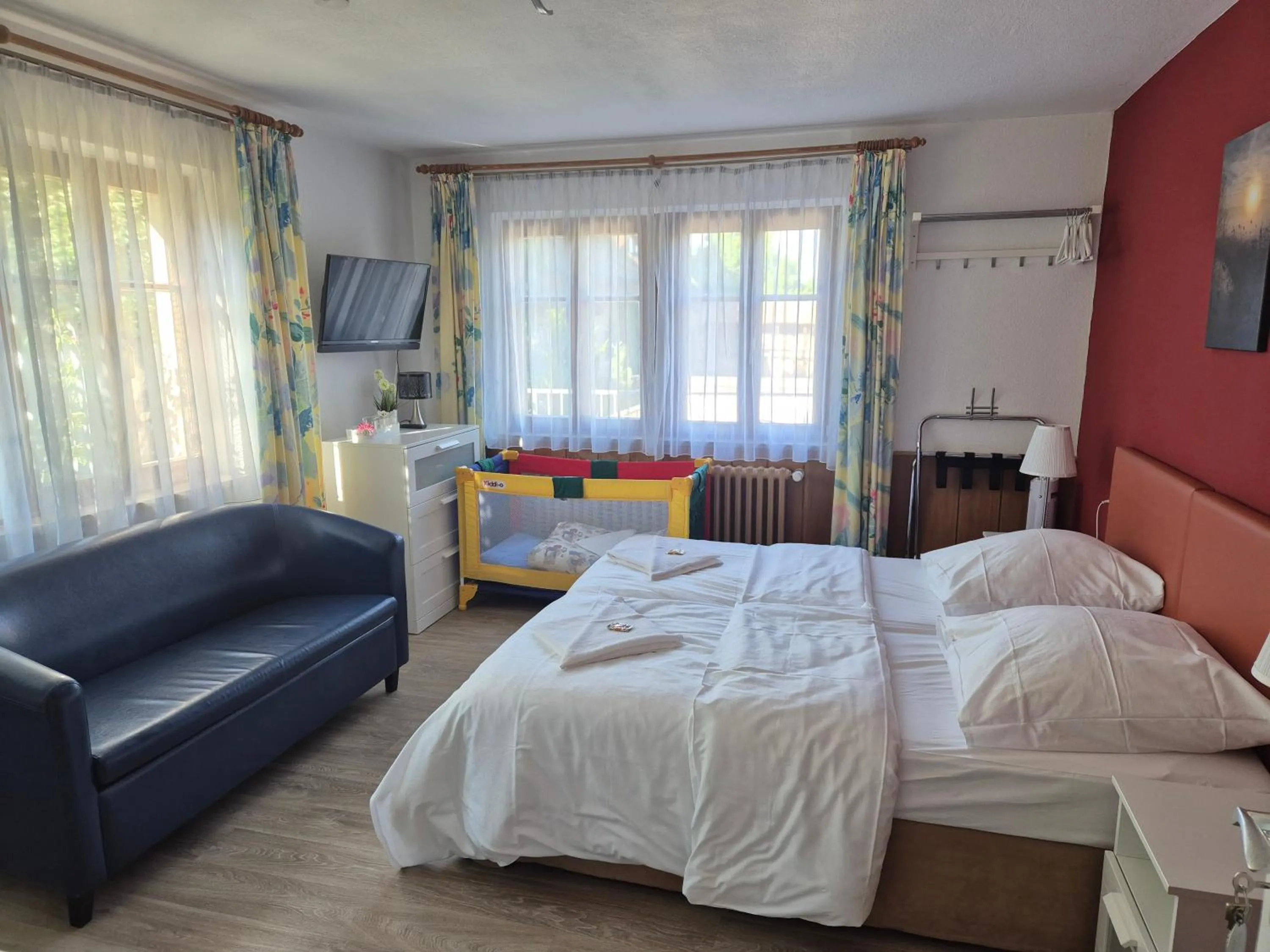 Photo of the whole room, Bed in Boutiquehotel Goldene Rose - self-check-in