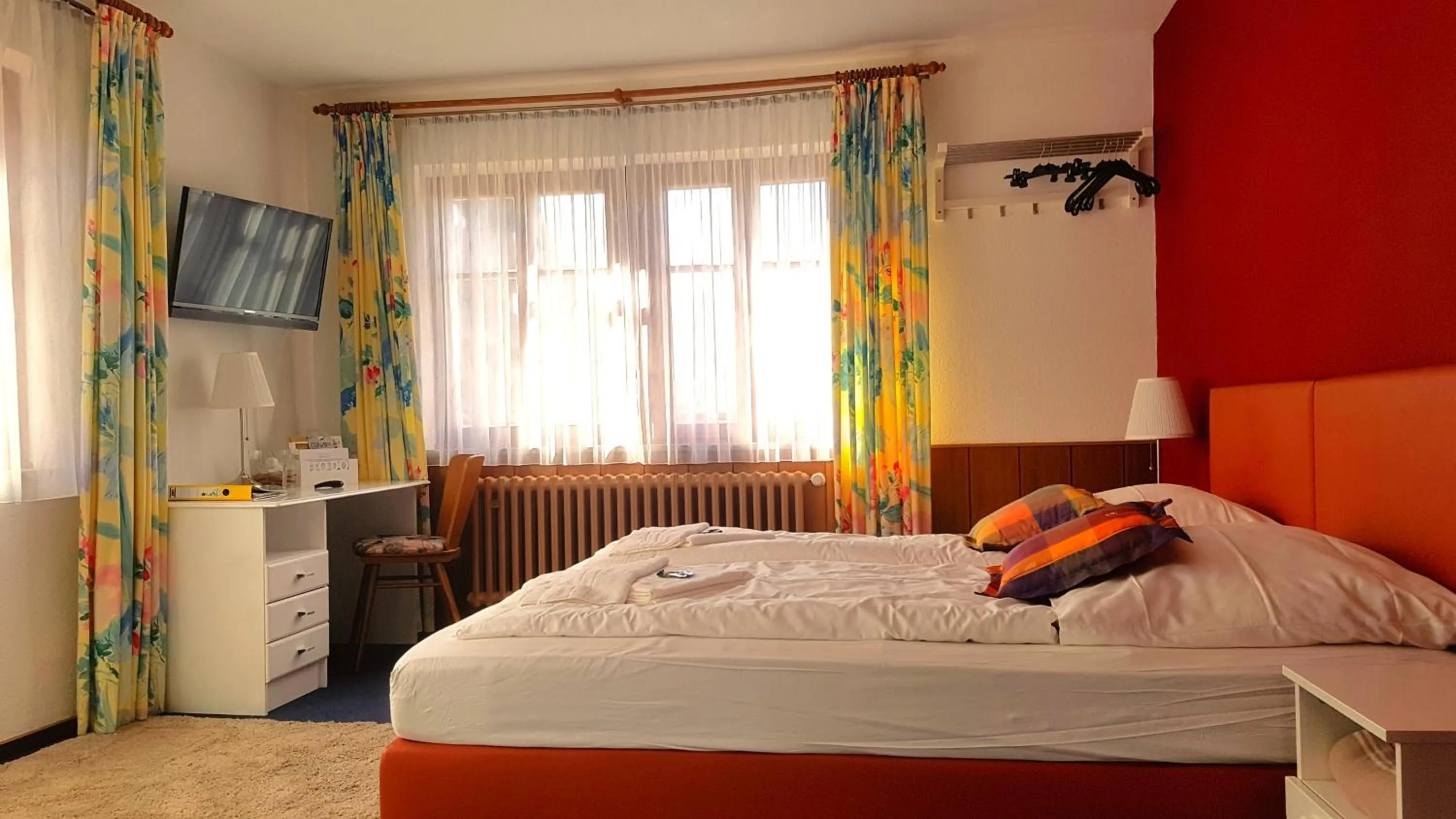 Photo of the whole room, Bed in Boutiquehotel Goldene Rose - self-check-in