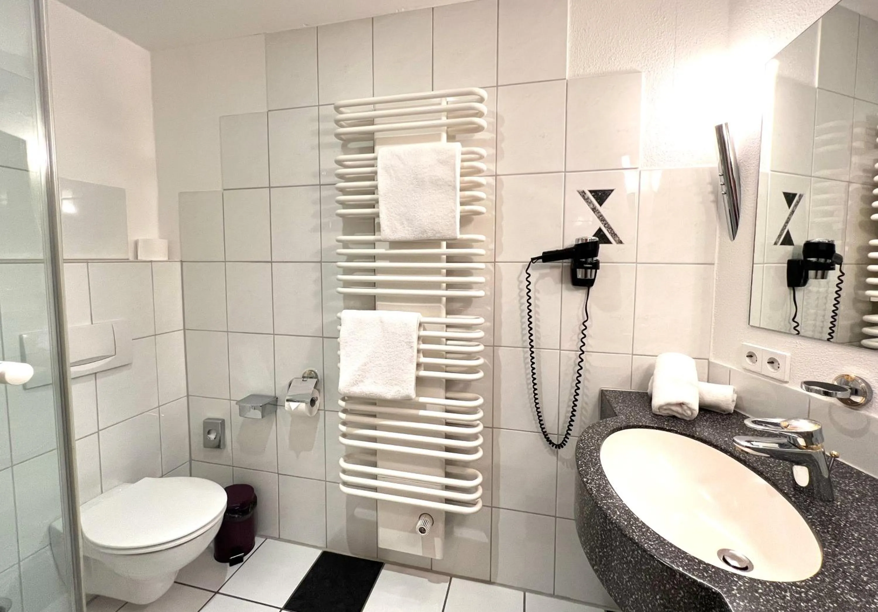 Bathroom in Hotel Am Hirschhorn - Wellness - Spa - and more