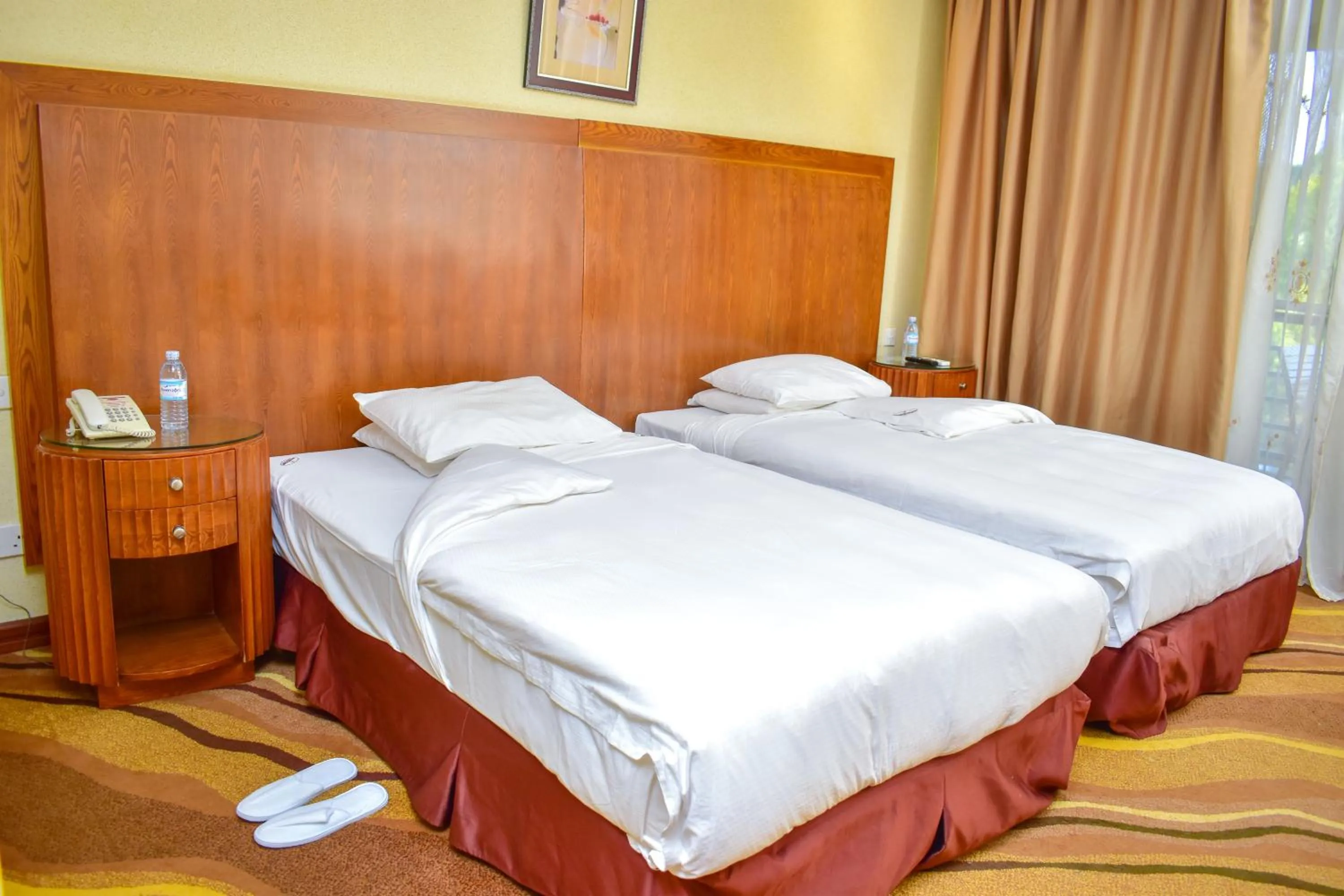 Bed in Mbale Resort Hotel