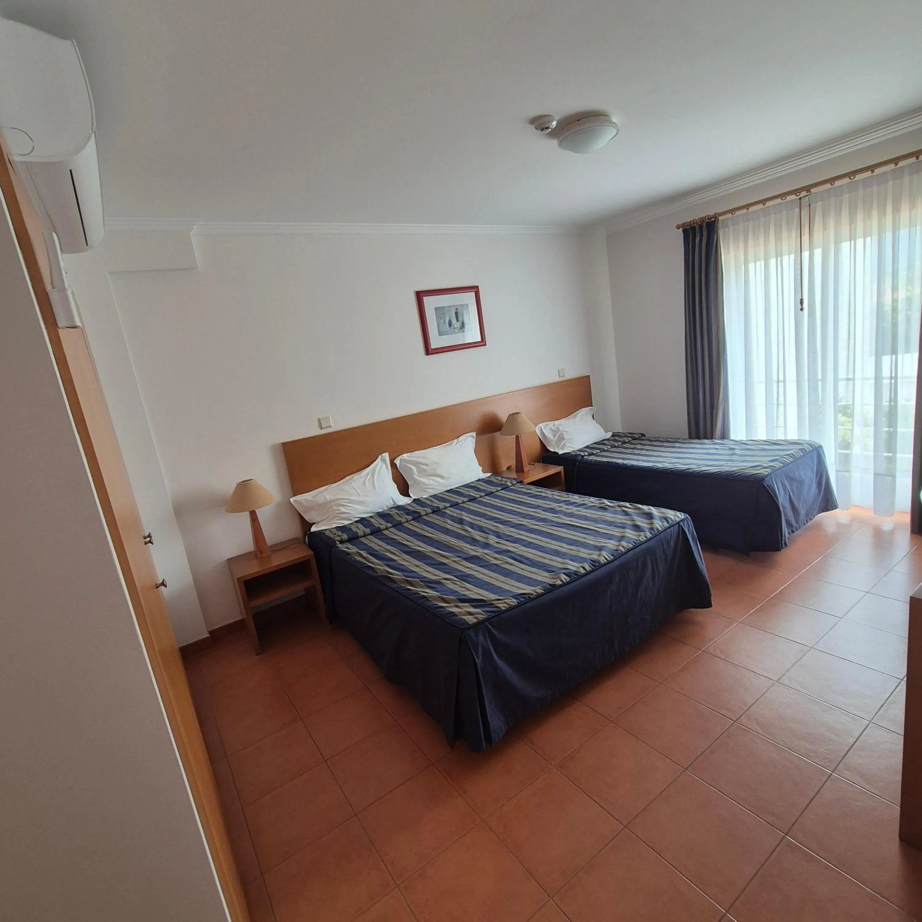 Photo of the whole room, Bed in Apartamentos Turísticos Vila Praia