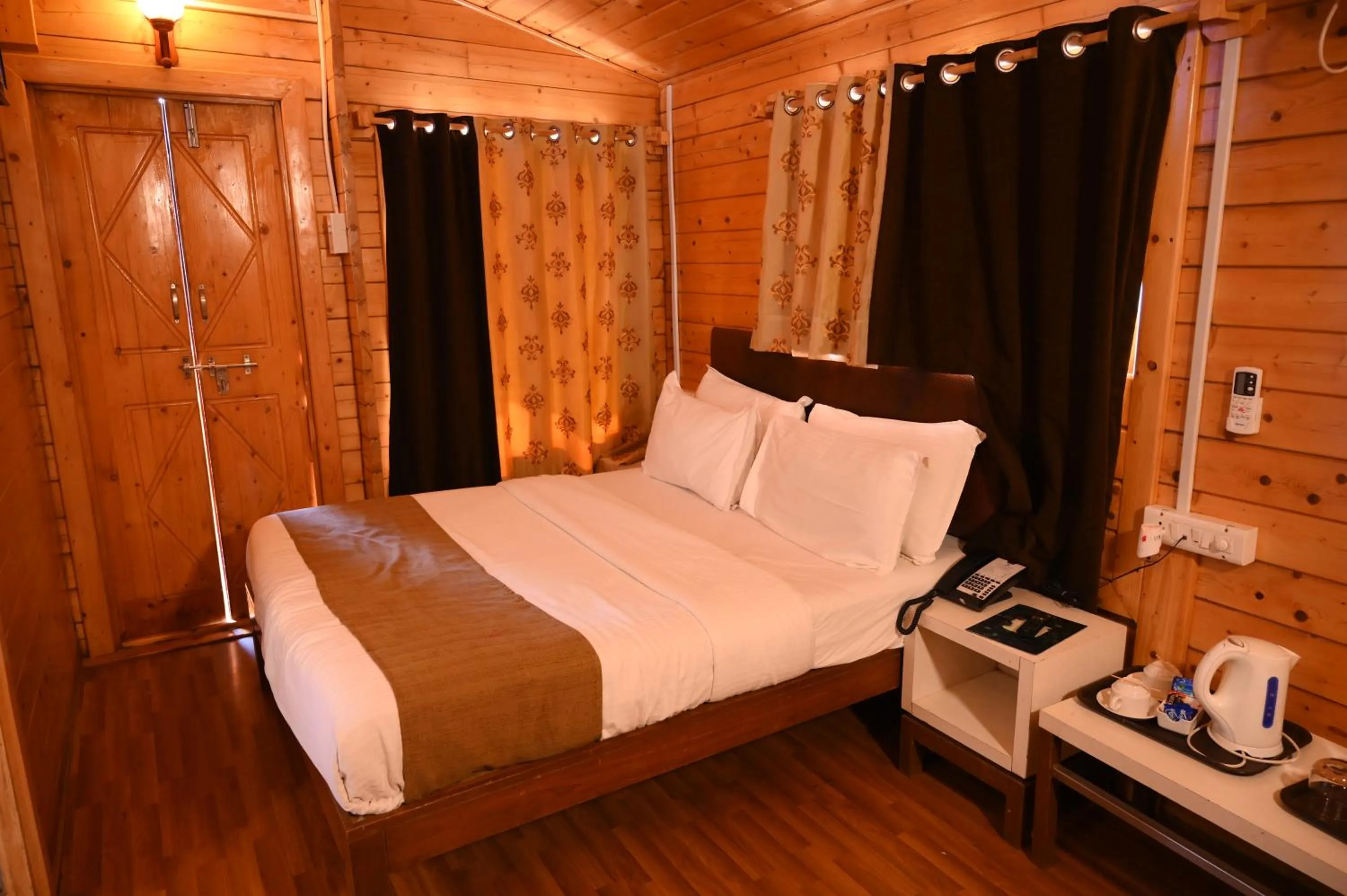 Photo of the whole room, Bed in The Grand Legacy Resort & Spa - TGL - Pure Vegetarian Mahabaleshwar