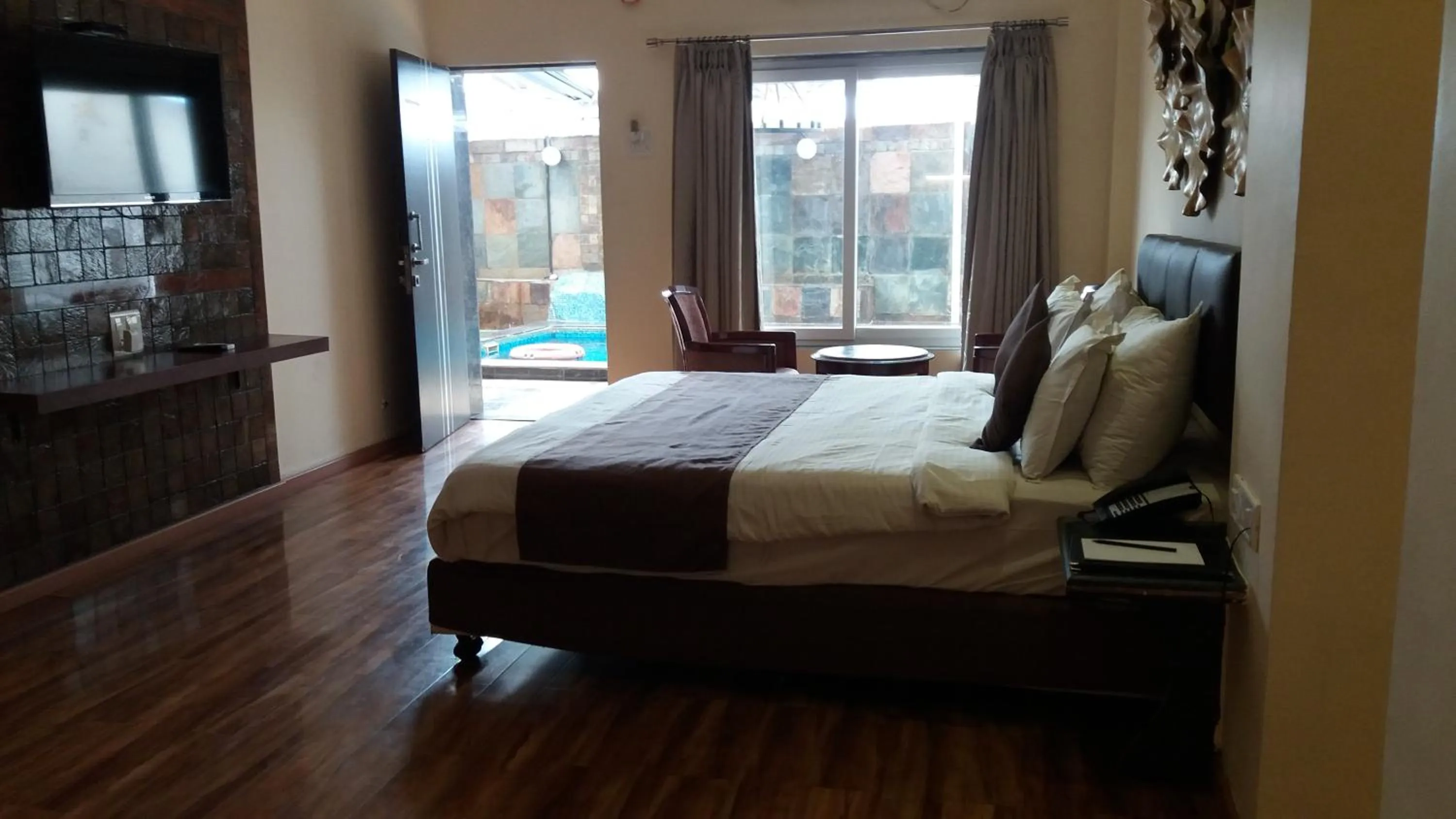 Photo of the whole room, Bed in The Grand Legacy Resort & Spa - TGL - Pure Vegetarian Mahabaleshwar