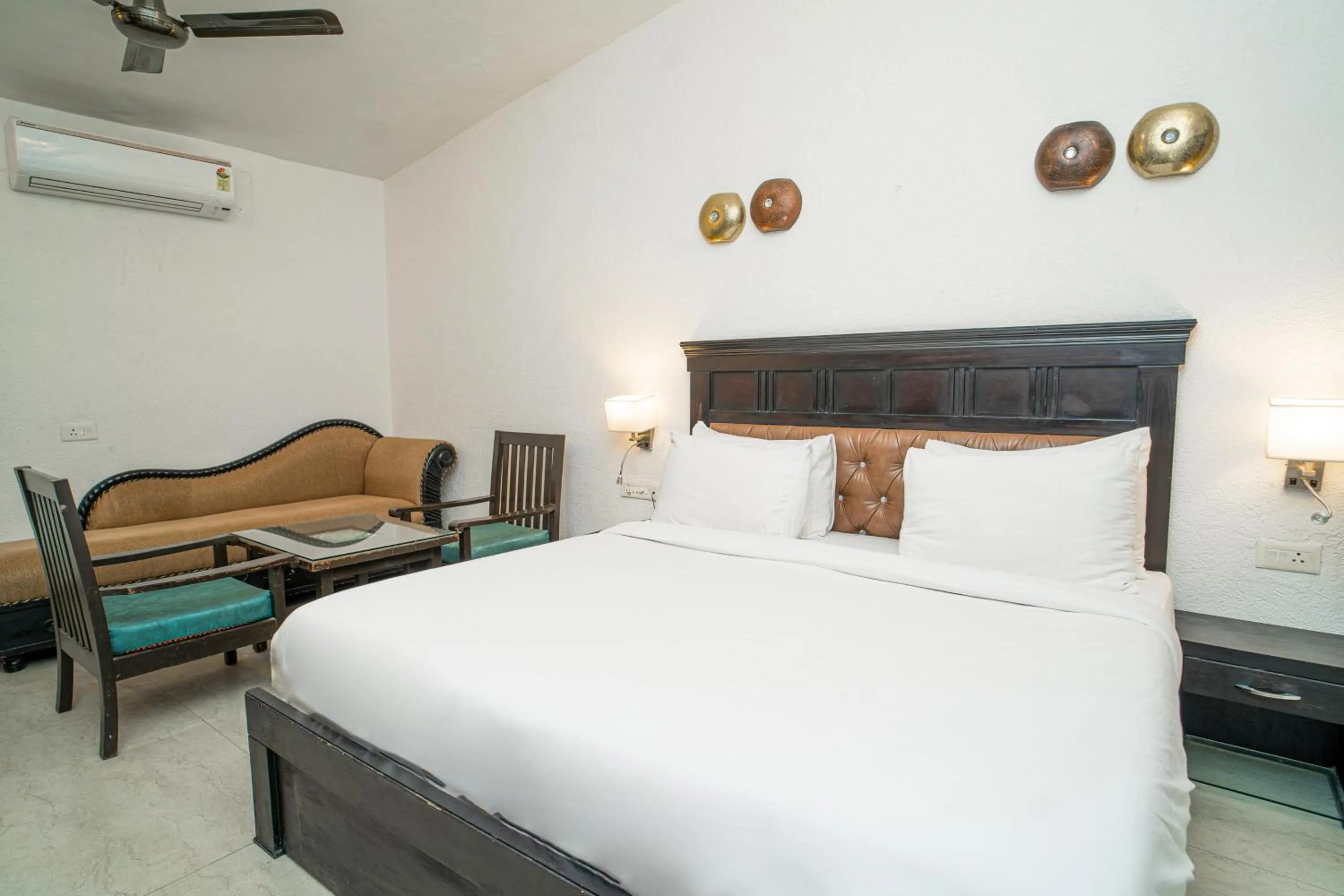 Bed in Hotel Ishan - A Ganges Riverside Retreat by Salvus