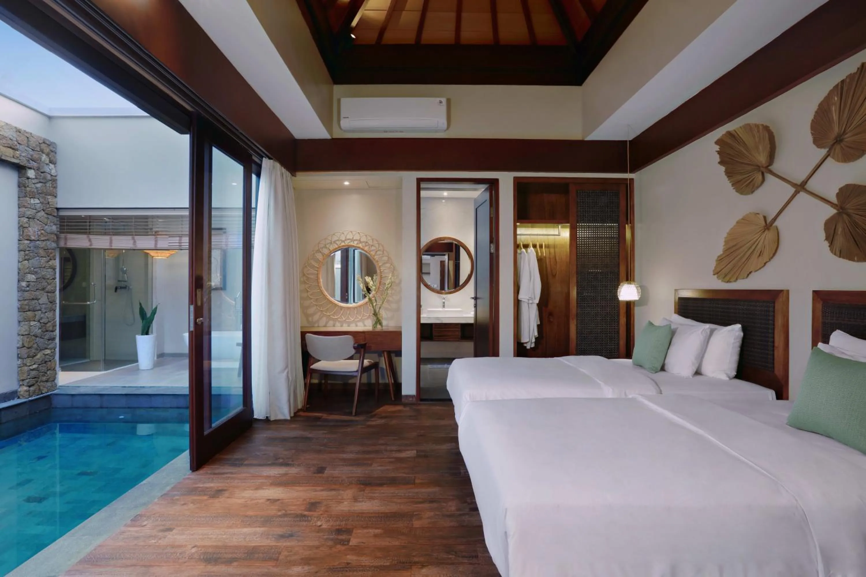 Bed in Kamuela Villa Lagoi Bay Bintan