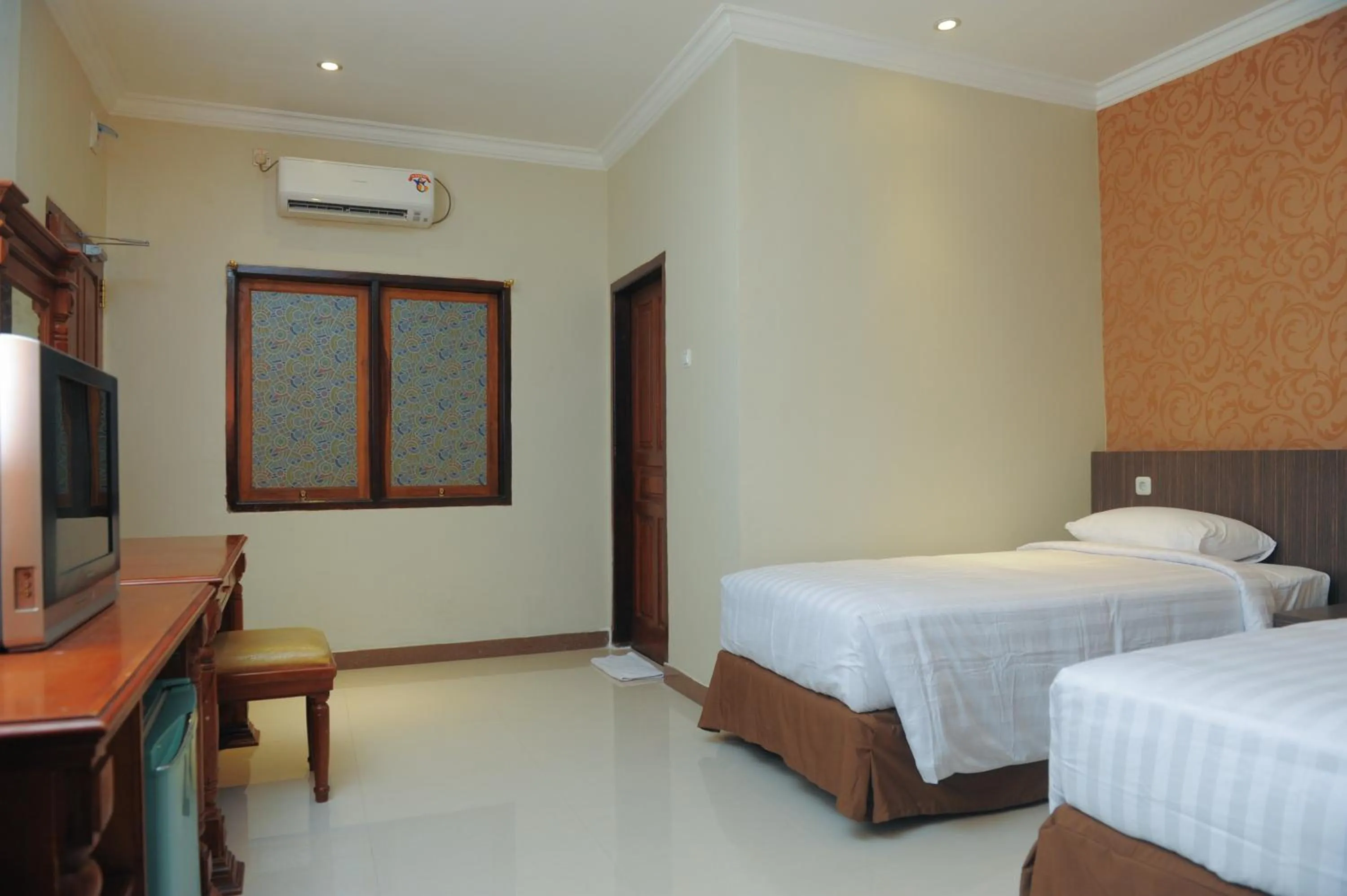 Bed in Sylvia Hotel Budget