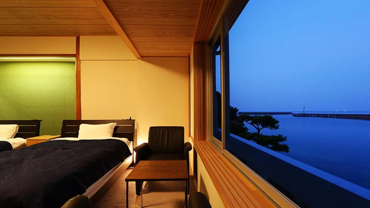 Bed in Okukinosaki Seaside Hotel