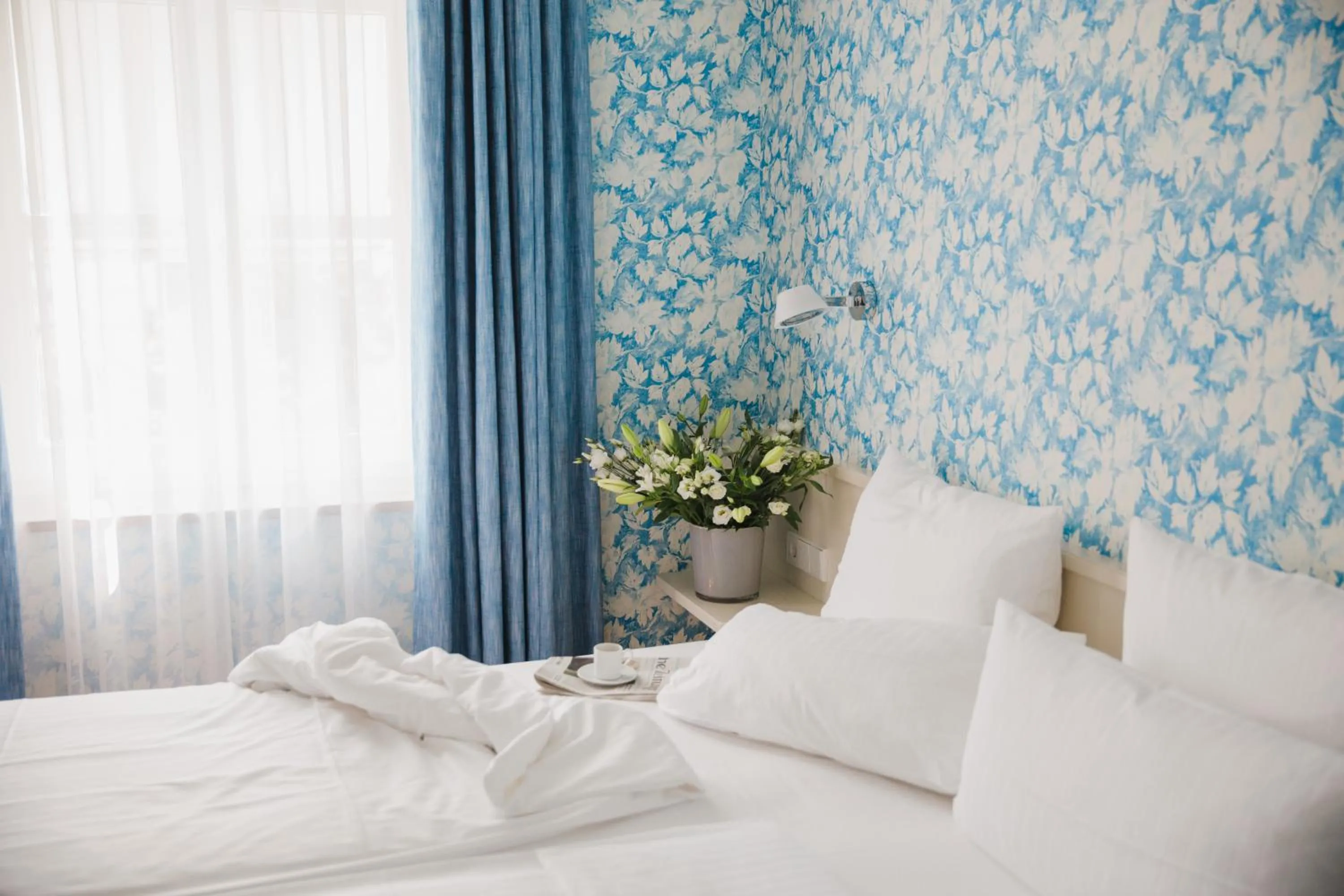 Bed in MOMA1890 Boutique Hotel