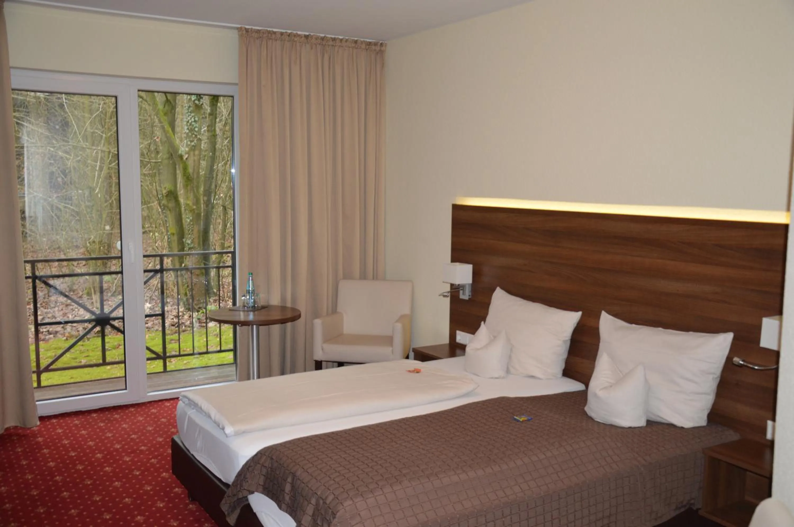 Bed in Hotel Holter Schloßkrug