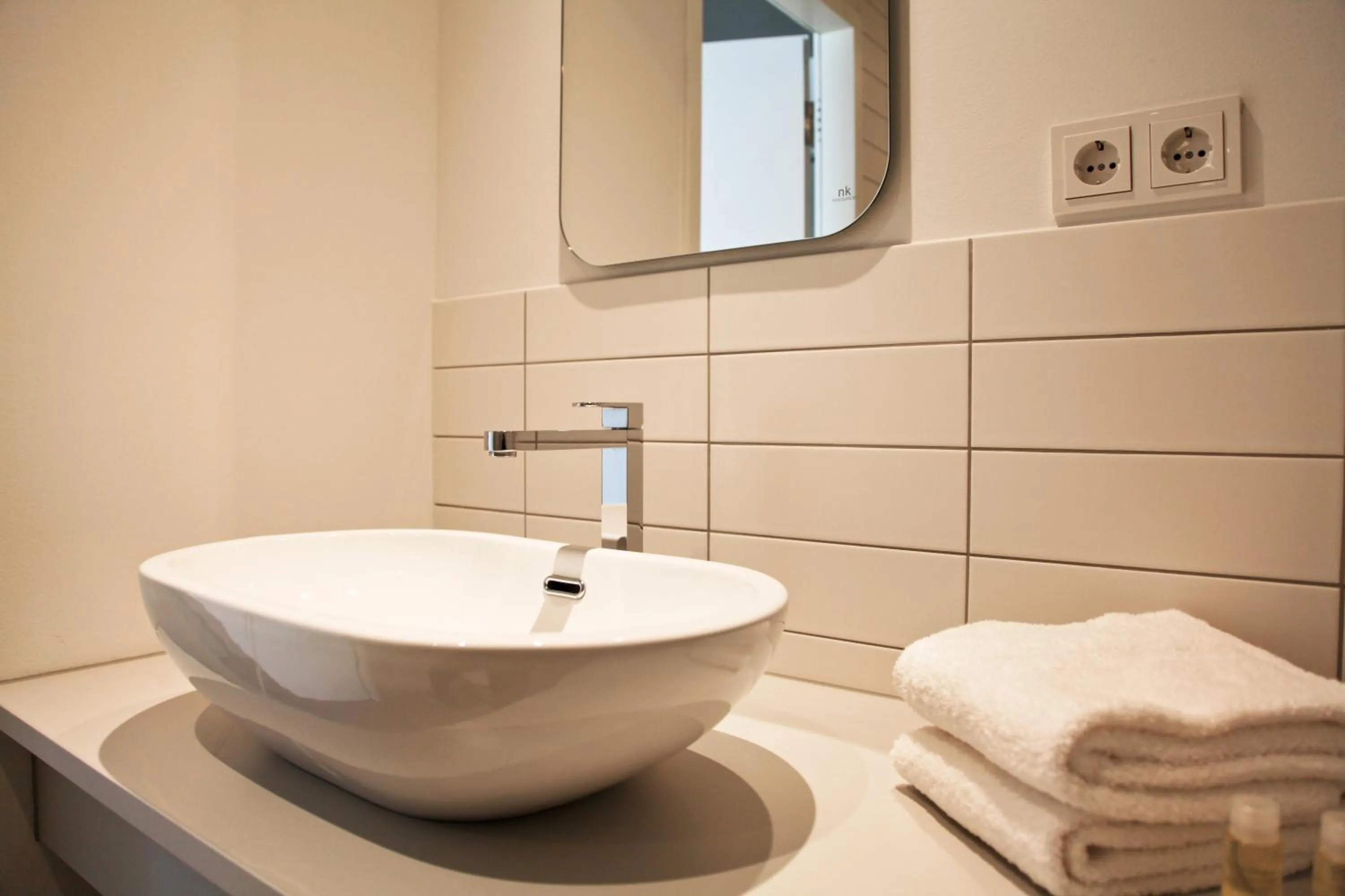 Bathroom in Country Inn Suitenhotel