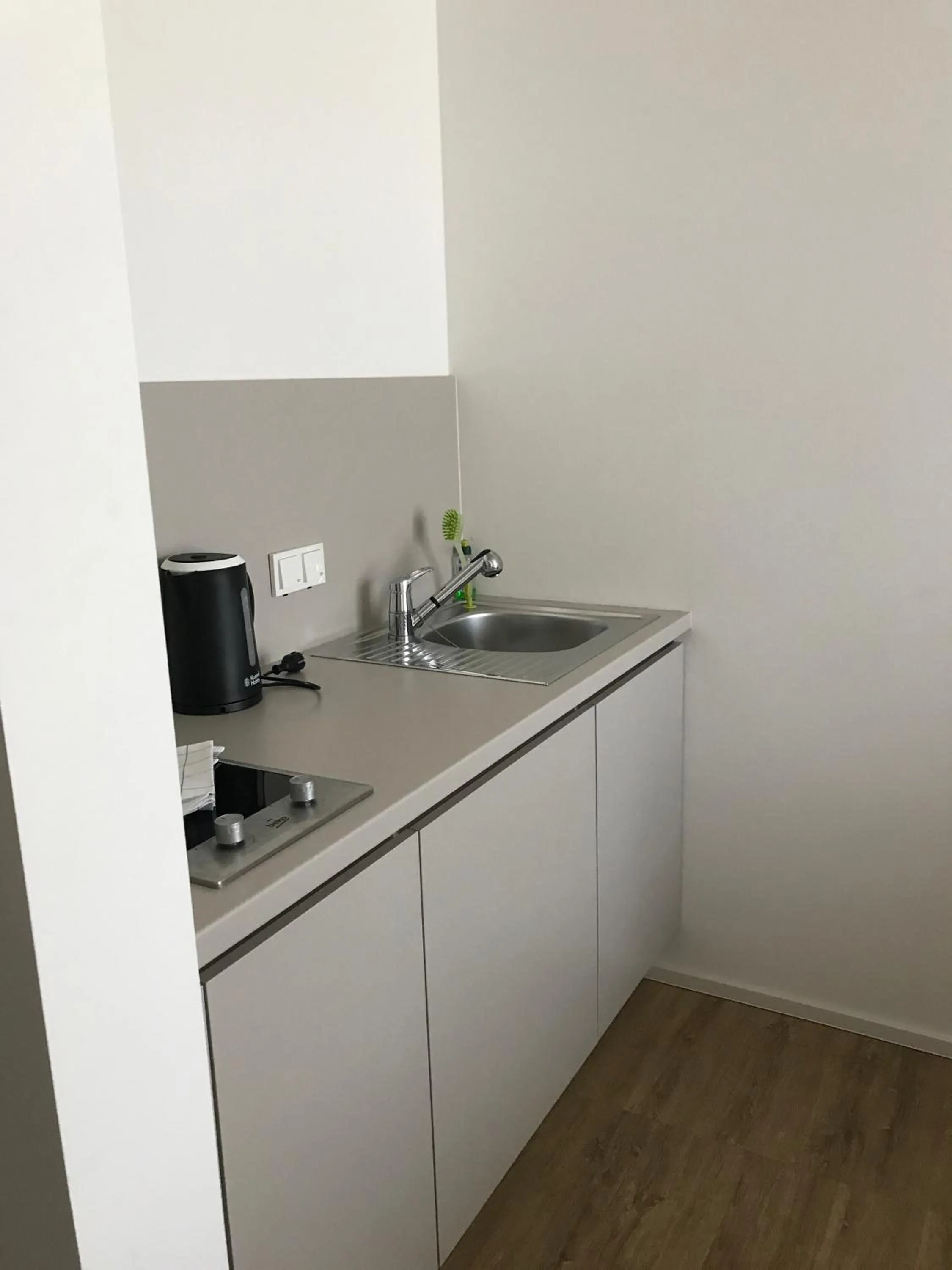 Kitchen or kitchenette in Country Inn Suitenhotel