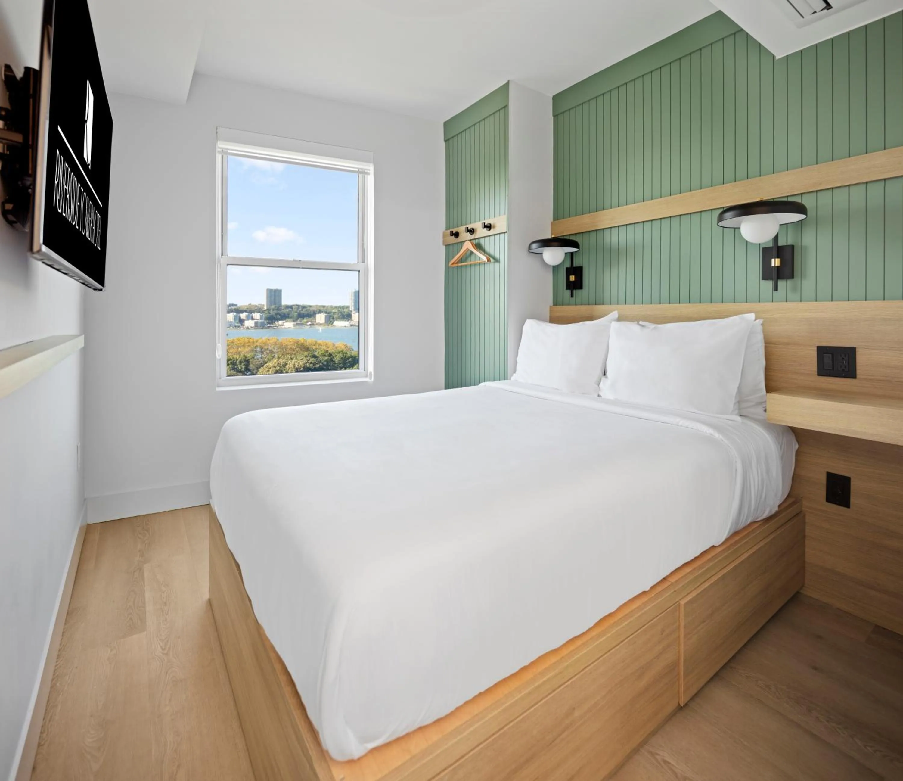 Bed in Riverside Tower Hotel