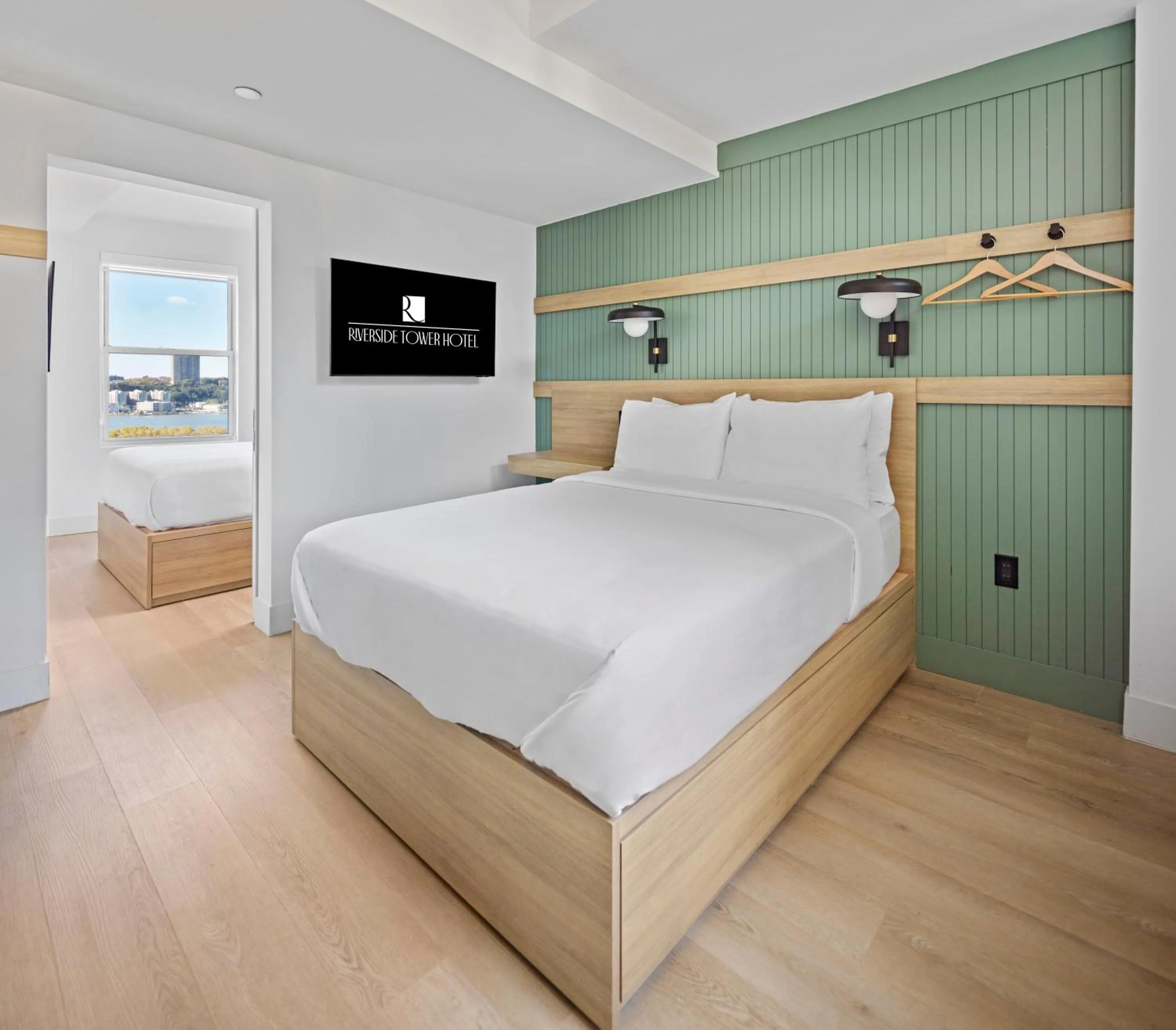 Bed in Riverside Tower Hotel