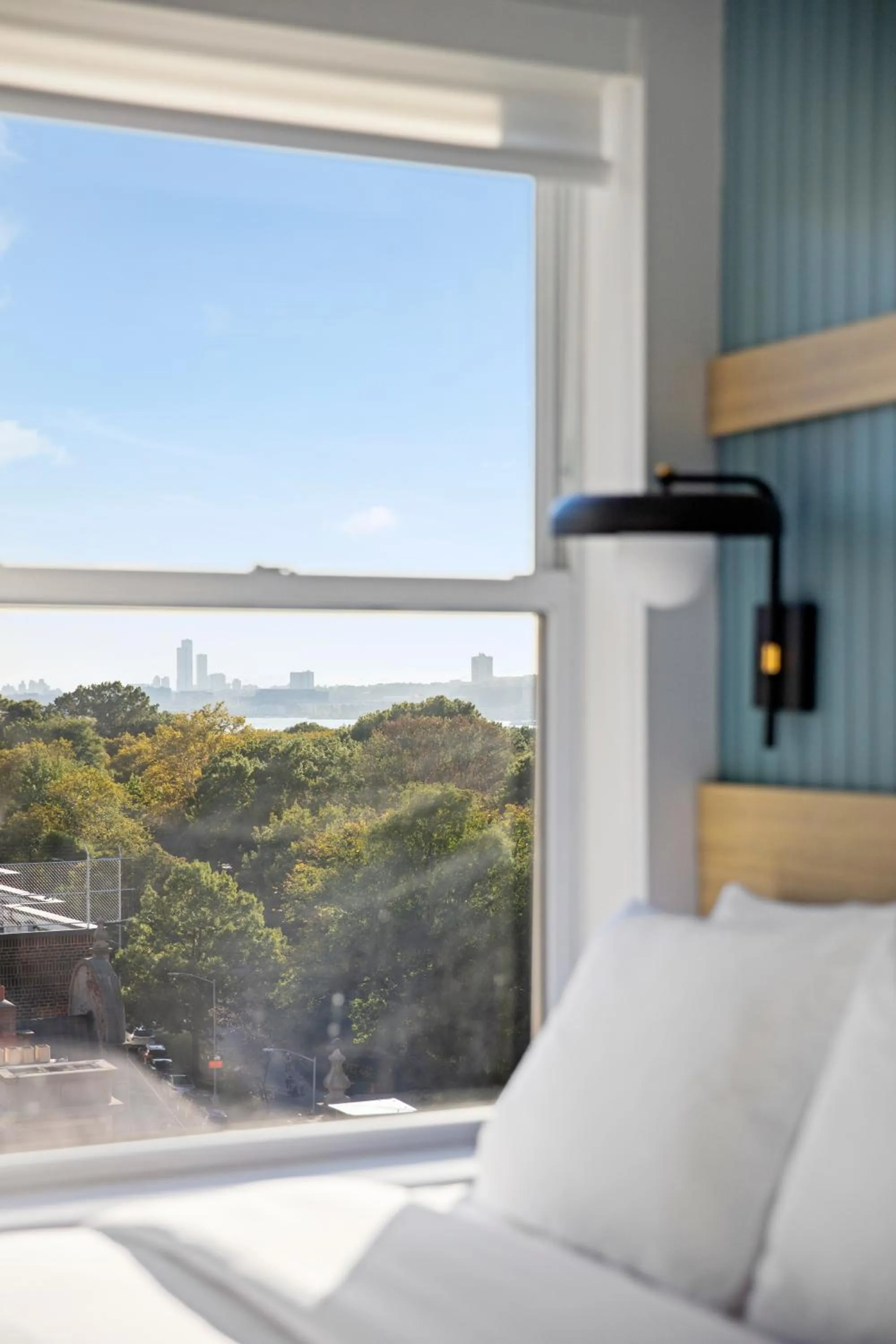 Bed in Riverside Tower Hotel