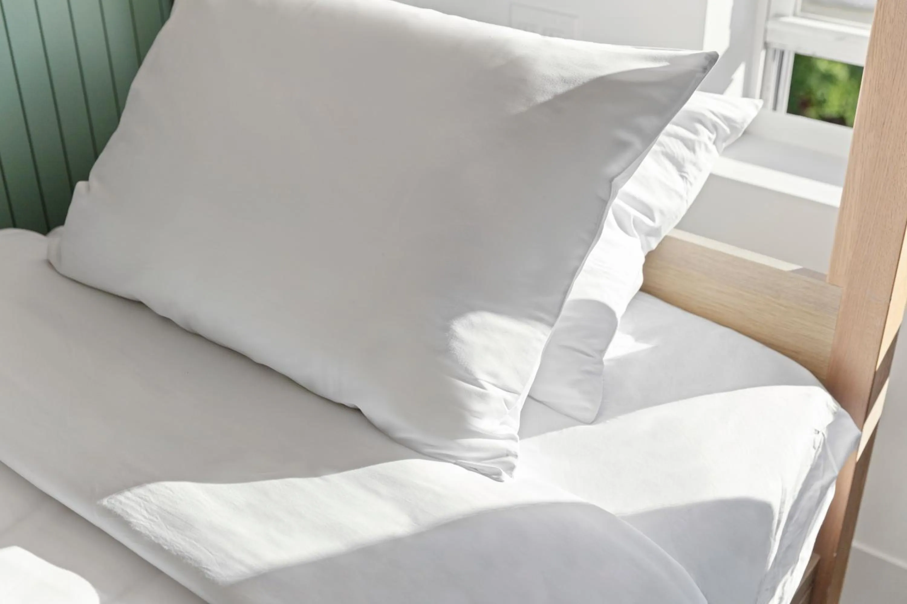 Bed in Riverside Tower Hotel