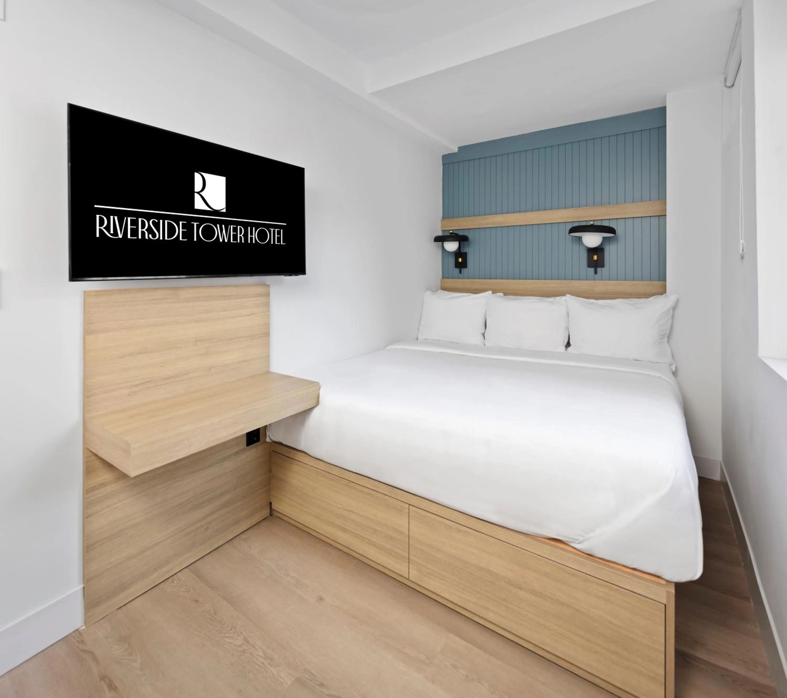 Bed in Riverside Tower Hotel