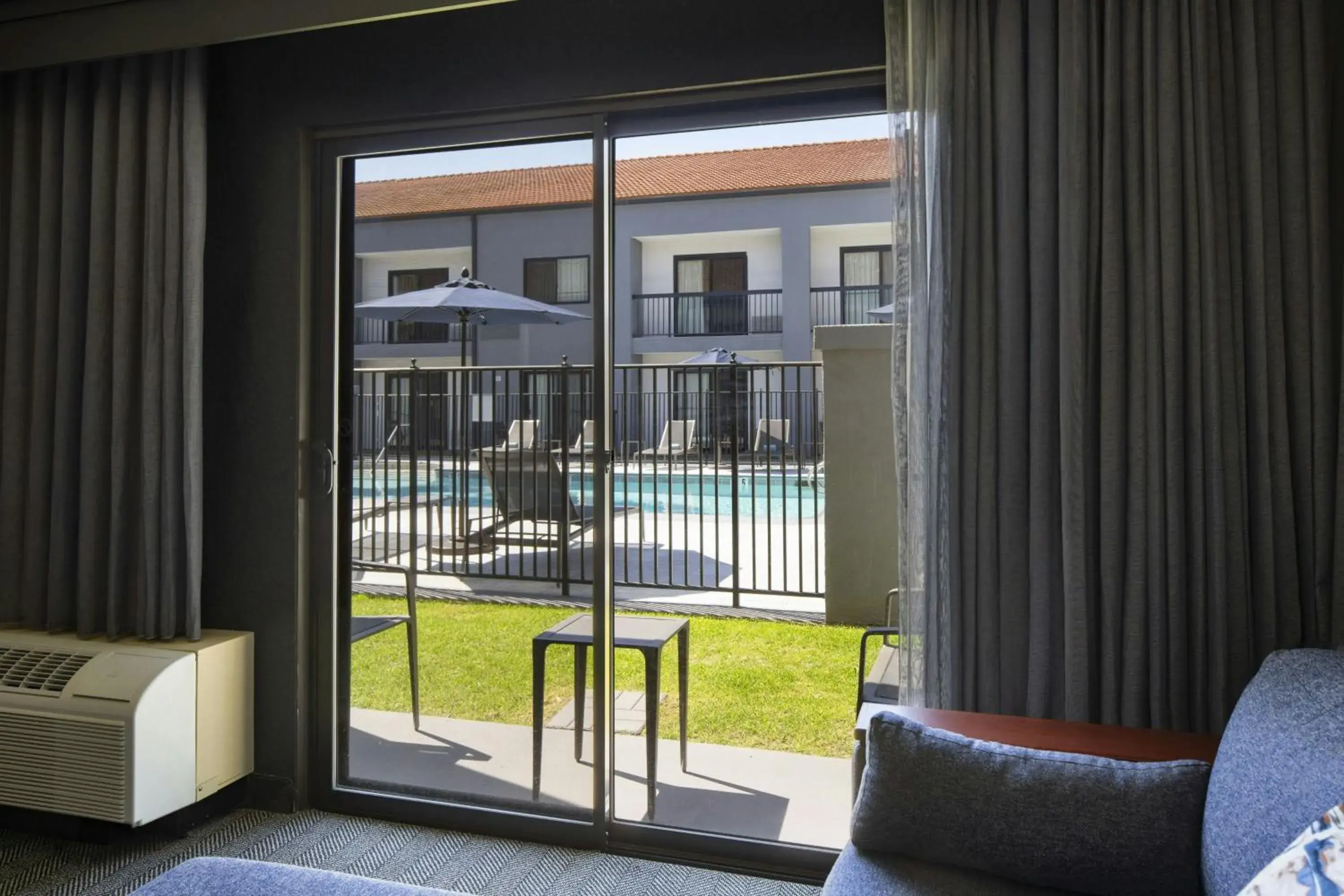 King Room with Sofa Bed, Patio and Pool View in Courtyard by Marriott Los Angeles Hacienda Heights Orange County King Room with Sofa Bed, Patio and Pool View in Courtyard by Marriott Los Angeles Hacienda Heights Orange County