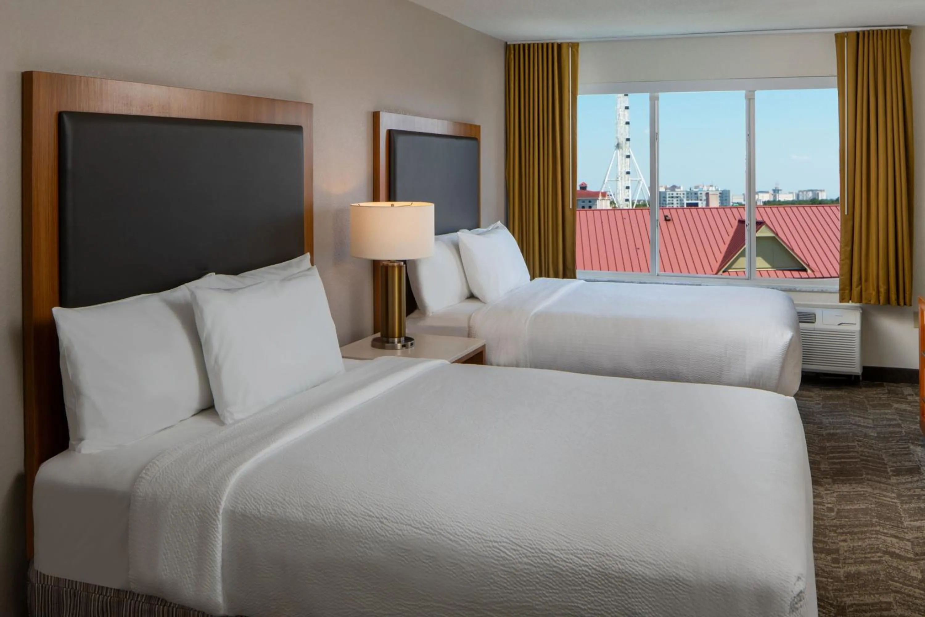 Photo of the whole room, Bed in SpringHill Suites by Marriott Orlando Convention Center