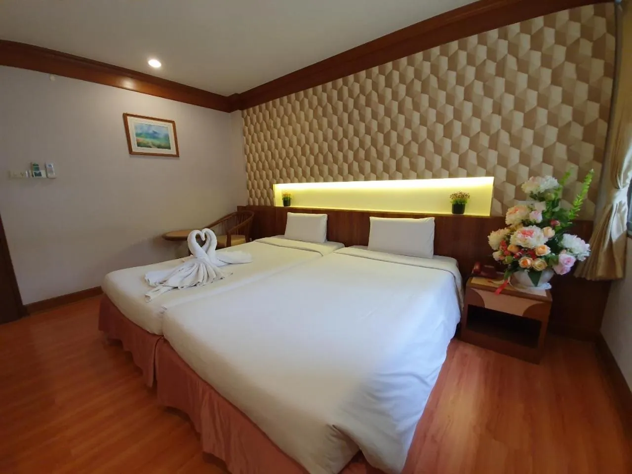 Bed in Sakol Hotel