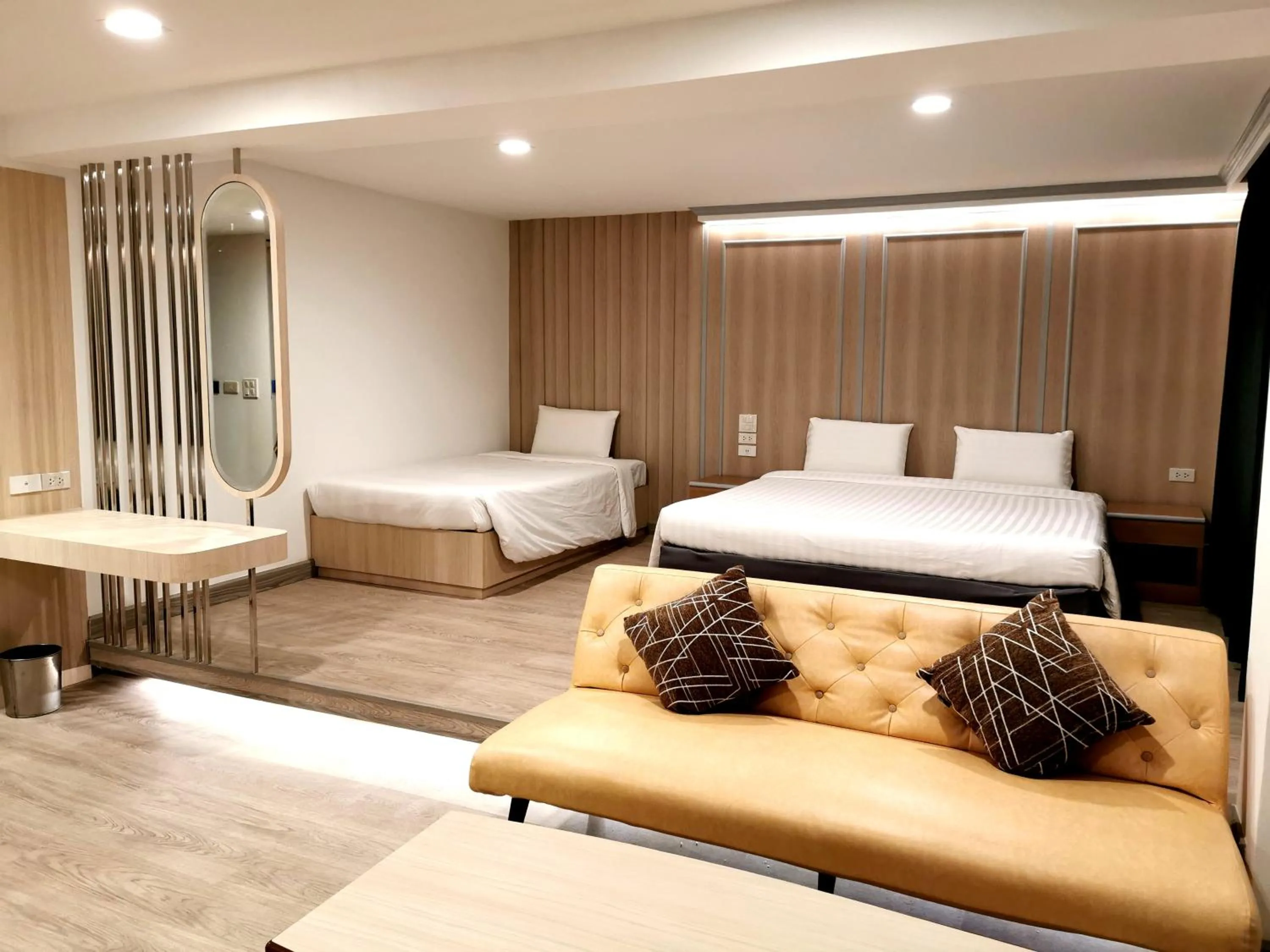 Seating area, Bed in Sakol Hotel