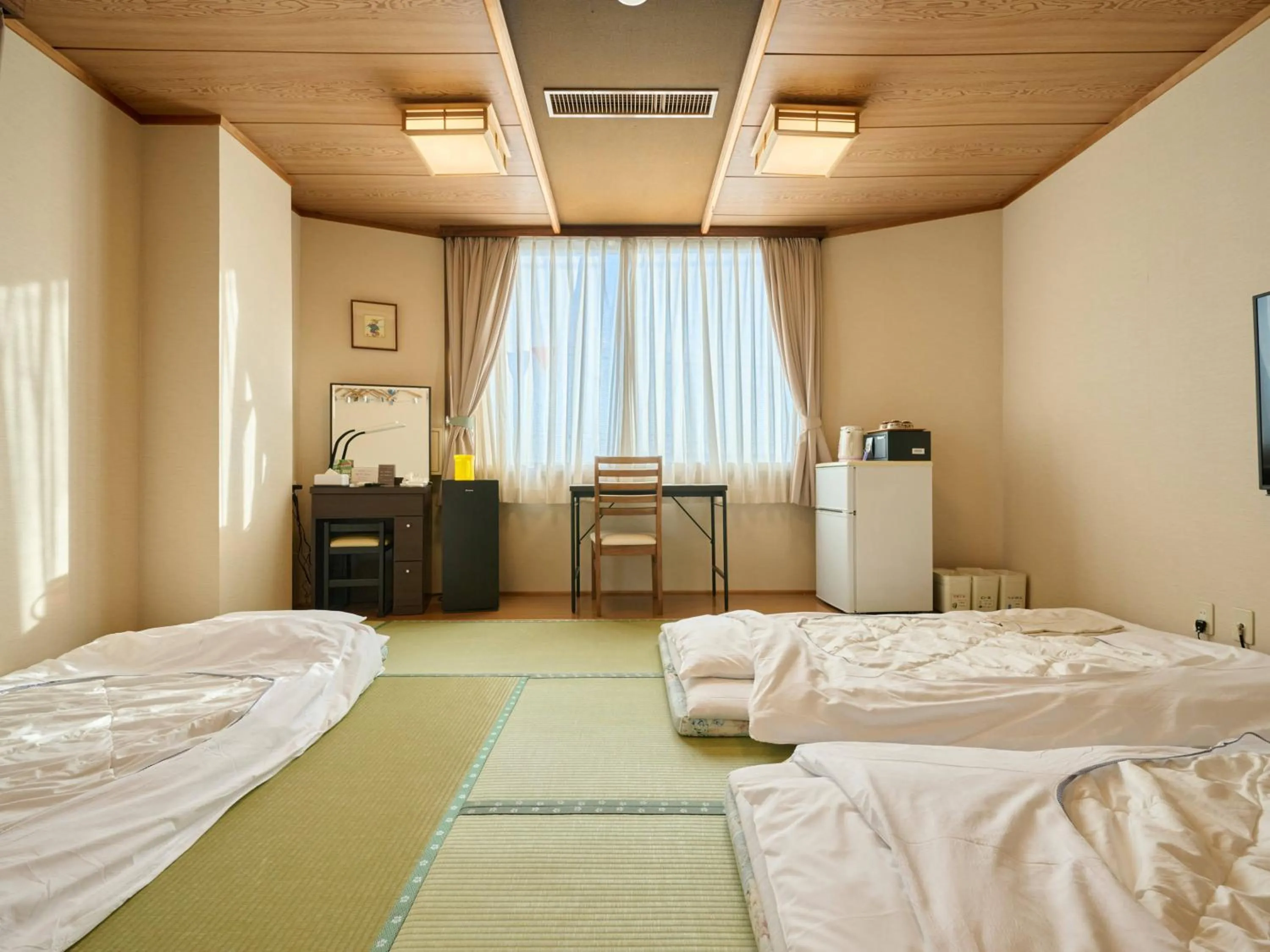 Photo of the whole room, Bed in Okasan Hotel