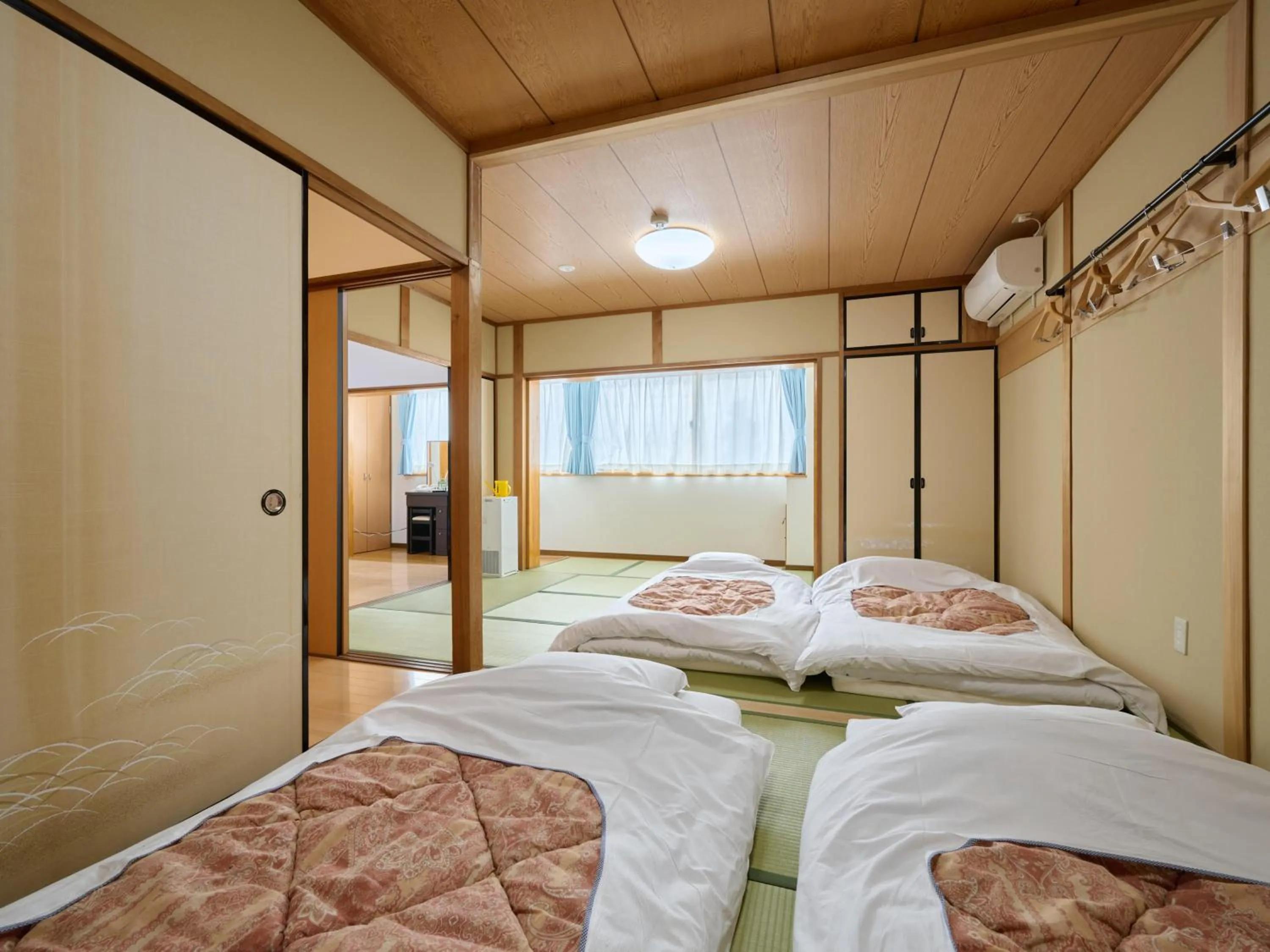 Photo of the whole room, Bed in Okasan Hotel