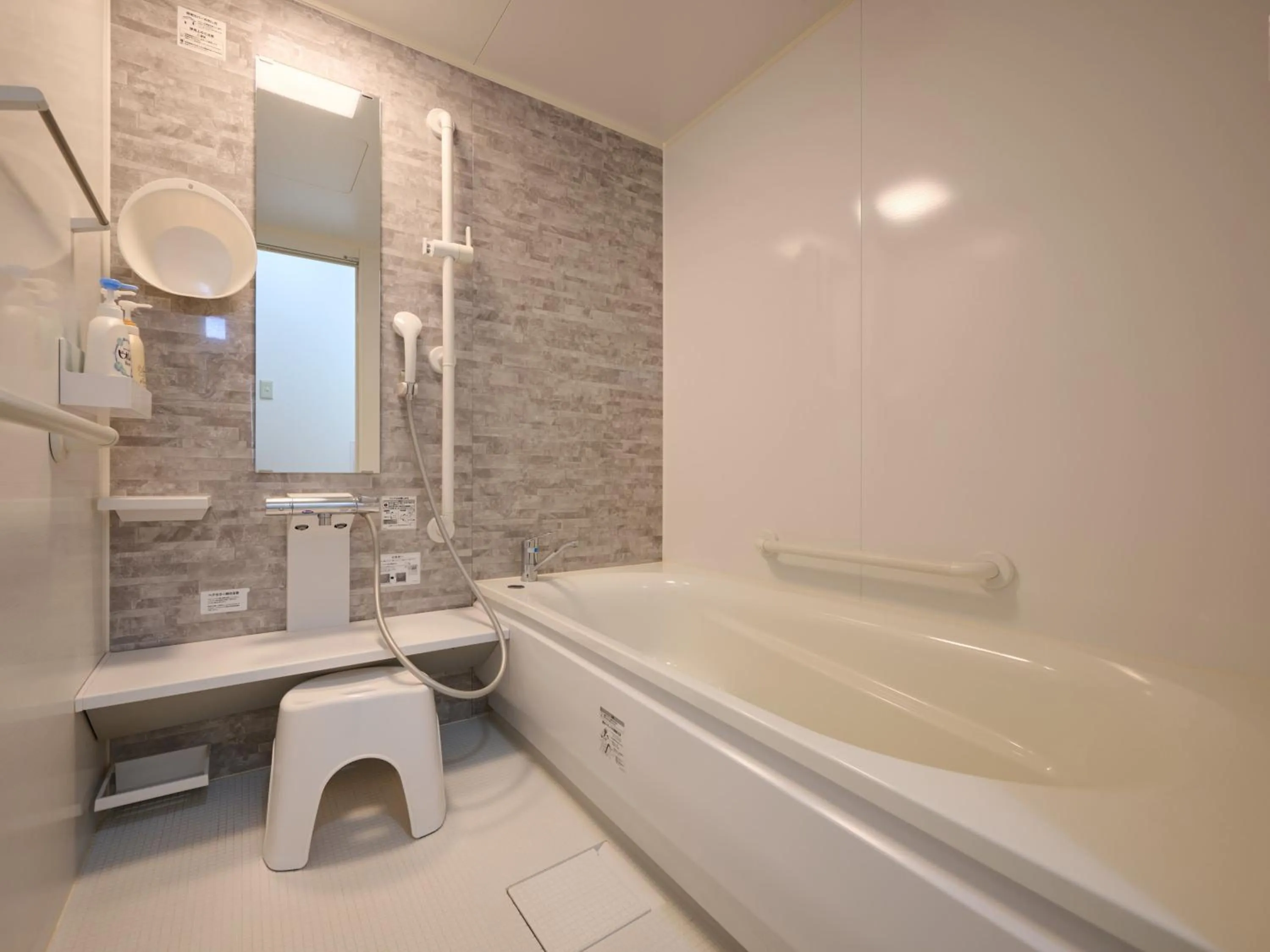 Bathroom in Okasan Hotel