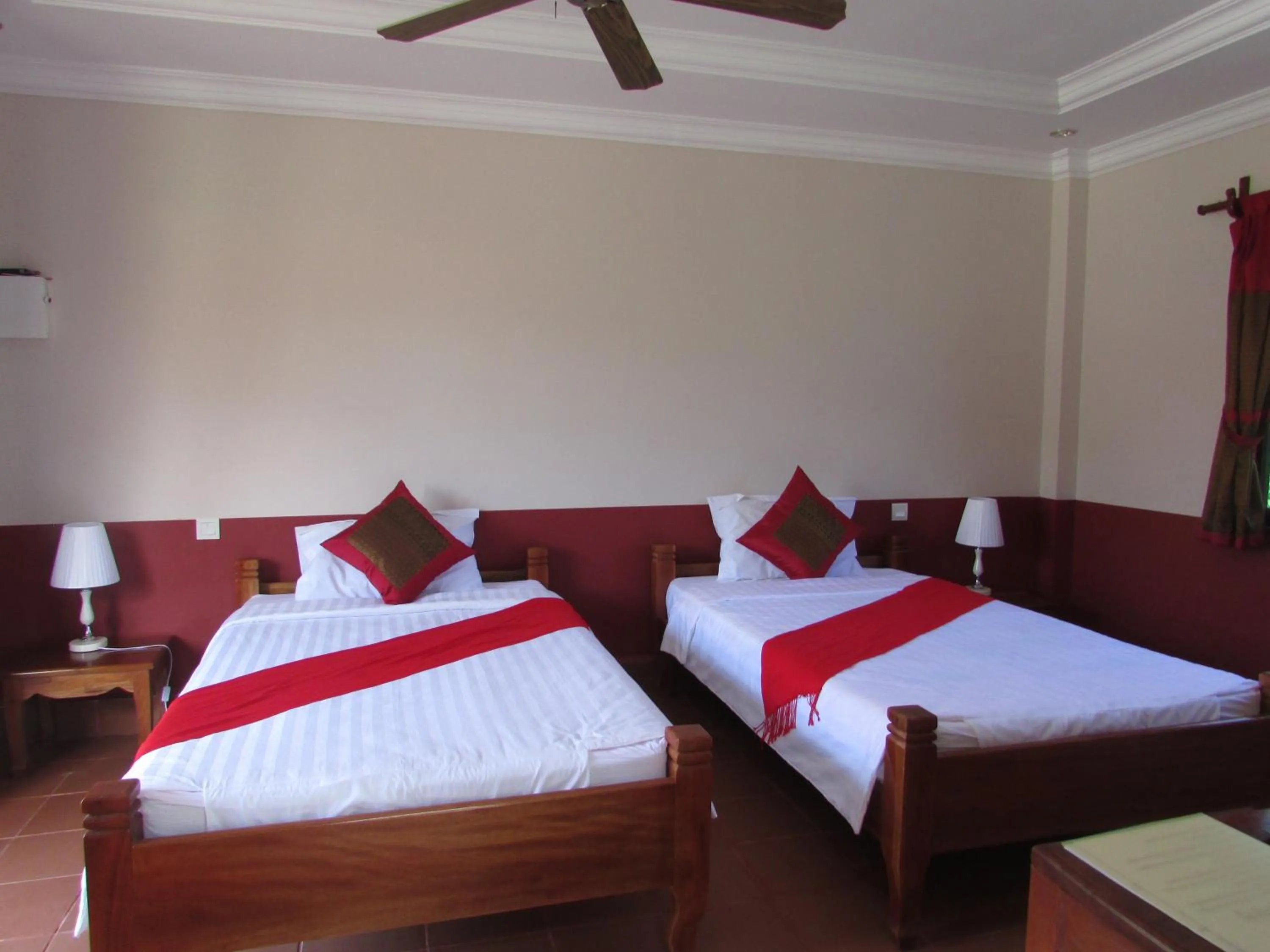 Bed in Phoumrumduol Bungalow